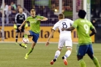 Oct 28, 2015; Seattle, WA, USA; Seattle Sounders FC midfielder Andy Rose (5) passes the ball against the Los Angeles Galaxy during the first half at CenturyLink Field. Seattle defeated Los Angeles 3-2. Mandatory Credit: Steven Bisig-USA TODAY Sports