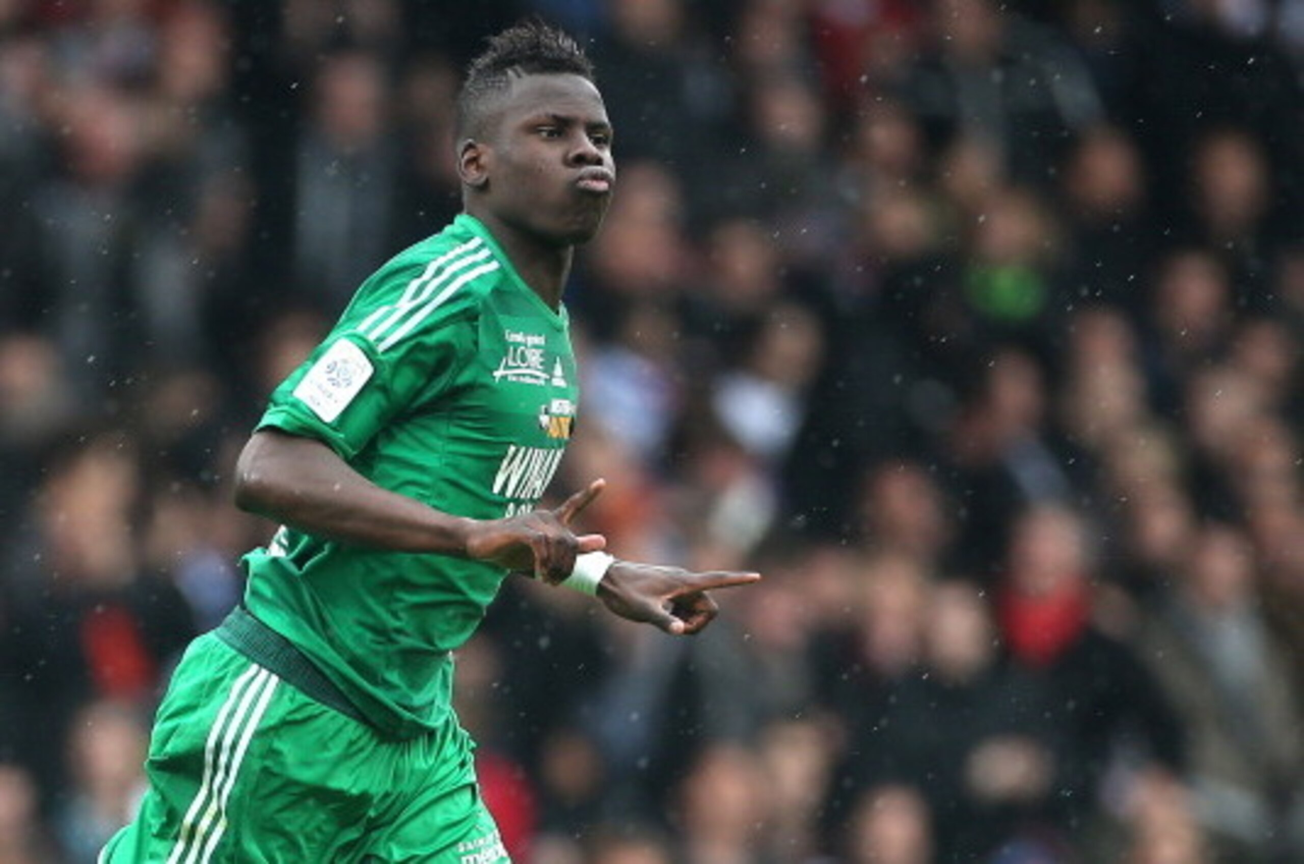 LYON, FRANCE - APRIL 28: Kurt Zouma of Saint-Etienne celebrates his goal during the Ligue 1 match between Olympique Lyonnais, OL, and AS Saint-Etienne, ASSE, at the Stade Gerland on April 28, 2013 in Lyon, France. (Photo by John Berry/Getty Images)