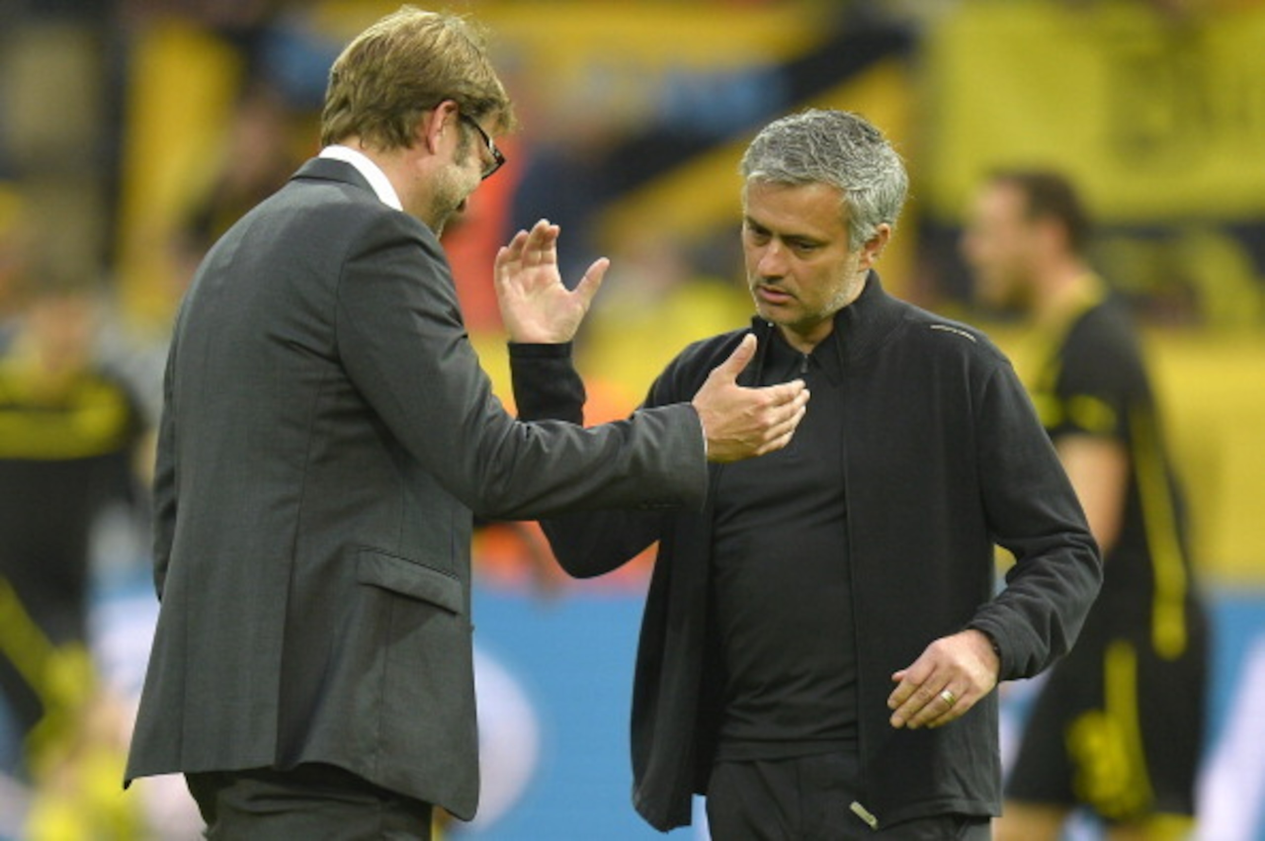 Dortmund's head coach Juergen Klopp (L) and Real Madrid's Portuguese coach Jose Mourinho greet each other before the UEFA Champions League semi final first leg football match between Borussia Dortmund and Real Madrid on April 24, 2013 in Dortmund, western