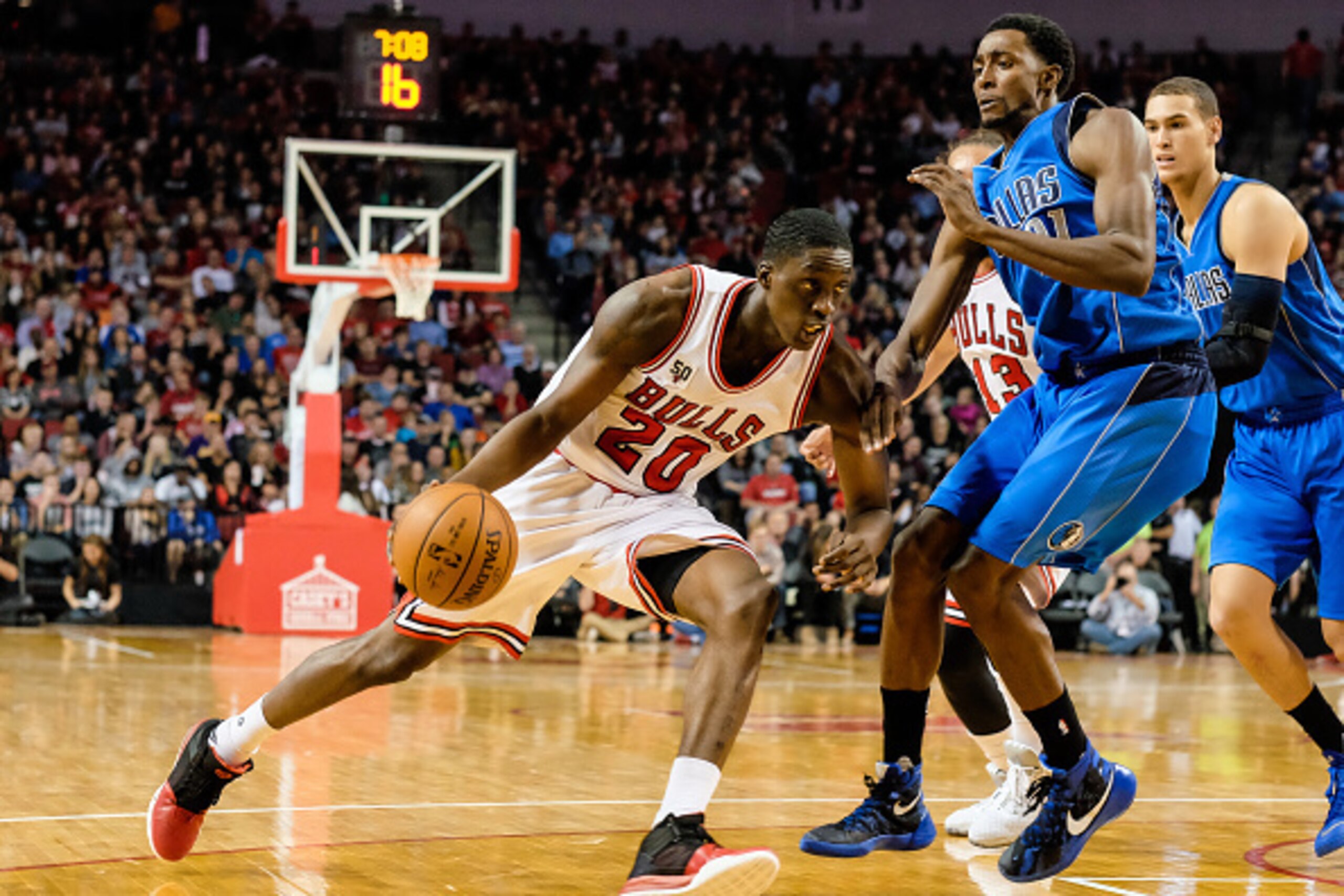 Lincoln, NE - OCTOBER 23:  Tony Snell #20 of the Chicago Bulls handles the ball against the Dallas Mavericks on October 23, 2015 at Pinnacle Bank Arena in Lincoln, Nebraska. NOTE TO USER: User expressly acknowledges and agrees that, by downloading and or 