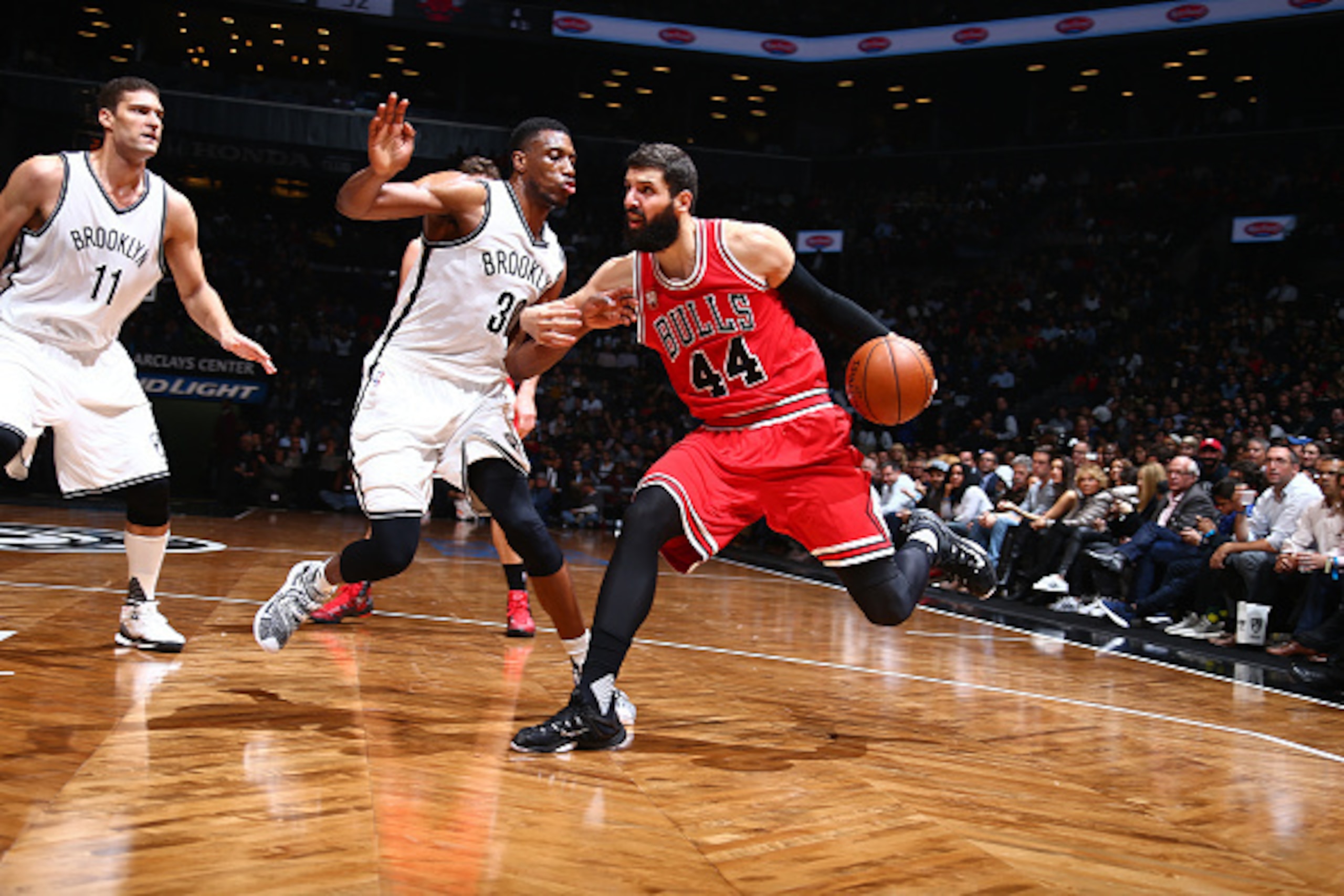 BROOKLYN, NY - OCTOBER 28:  Nikola Mirotic #44 of the Chicago Bulls handles the ball against the Brooklyn Nets on October 28, 2015 at Barclays Center in Brooklyn, New York. NOTE TO USER: User expressly acknowledges and agrees that, by downloading and or u