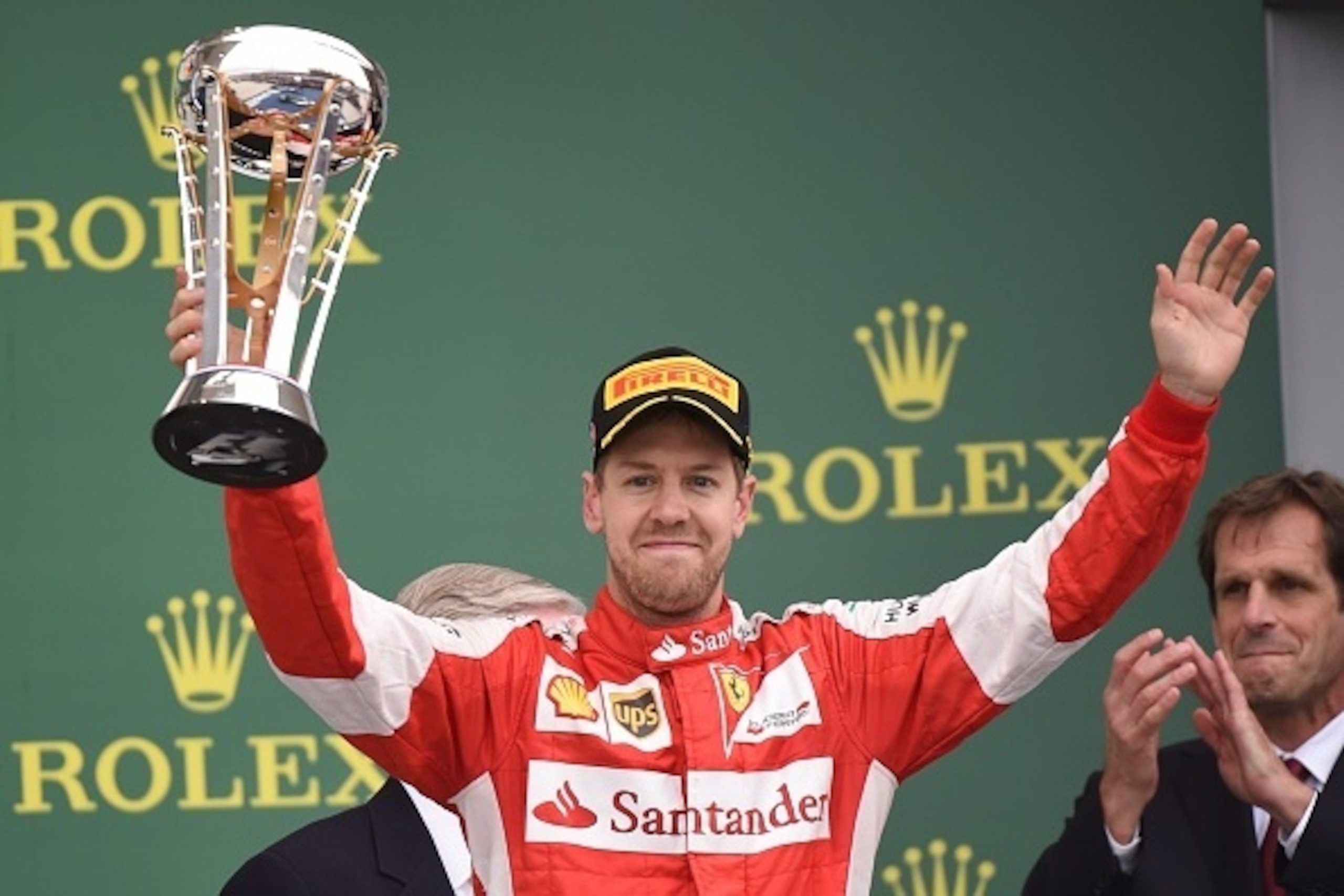 Scuderia Ferrari driver Sebastian Vettel of Germany with his trophy after finishing in third place during the United States Formula One Grand Prix and the Drivers Championships at the Circuit of The Americas in Austin, Texas on October 25, 2015. Scuderia Ferrari driver Sebastian Vettel of Germany with his trophy after finishing in third place during the United States Formula One Grand Prix and the Drivers Championships at the Circuit of The Americas in Austin, Texas on October 25, 2015.