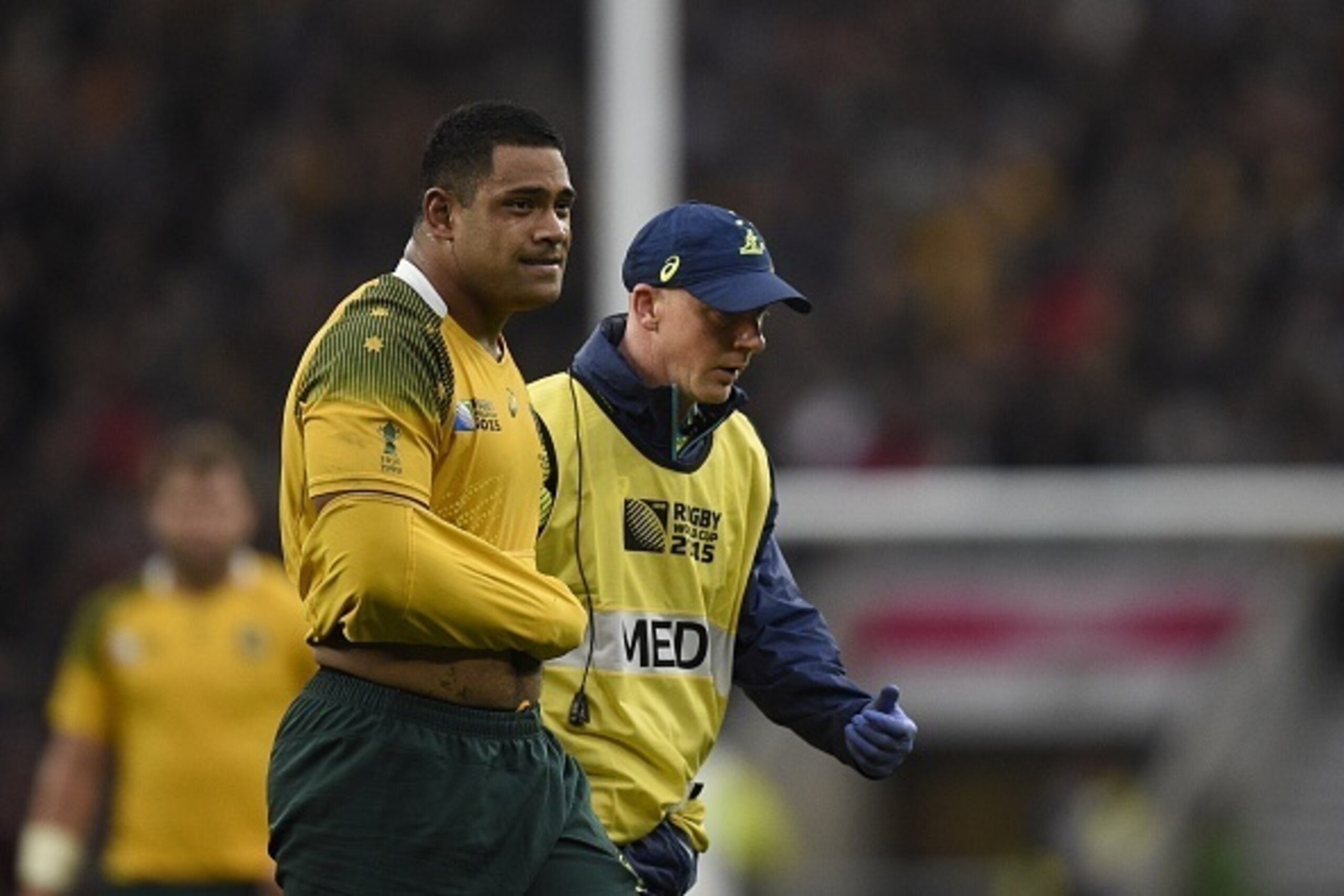 Australia's prop Scott Sio (L) is taken off the pitch during a quarter final match of the 2015 Rugby World Cup between Australia and Scotland at Twickenham stadium, southwest London on October 18, 2015. AFP PHOTO / MARTIN BUREAU
RESTRICTED TO EDITORIAL Australia's prop Scott Sio (L) is taken off the pitch during a quarter final match of the 2015 Rugby World Cup between Australia and Scotland at Twickenham stadium, southwest London on October 18, 2015. AFP PHOTO / MARTIN BUREAU
RESTRICTED TO EDITORIAL