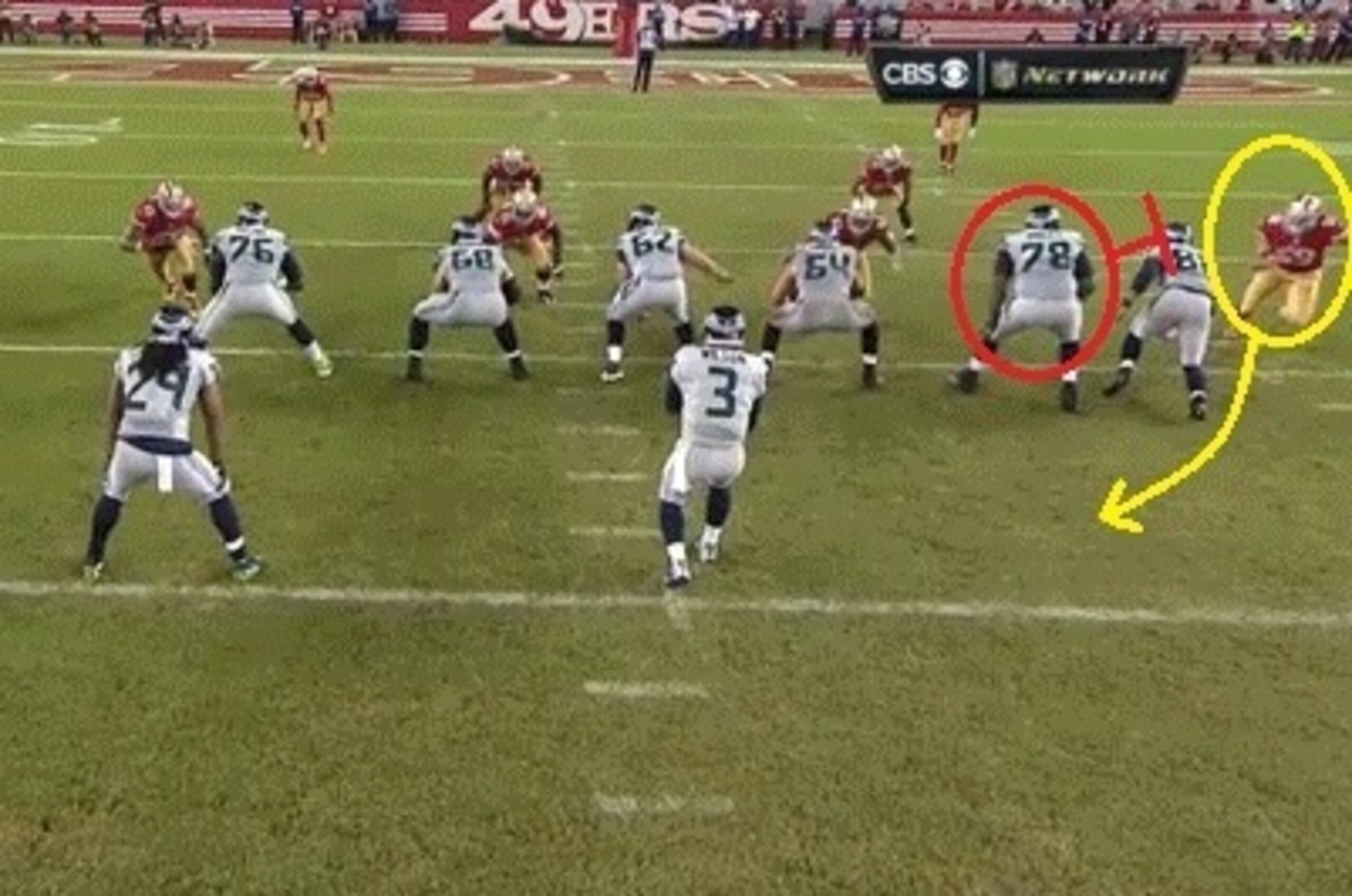Lynch is easily able to scoot past the Seahawks O-line and rush quarterback Russell Wilson.