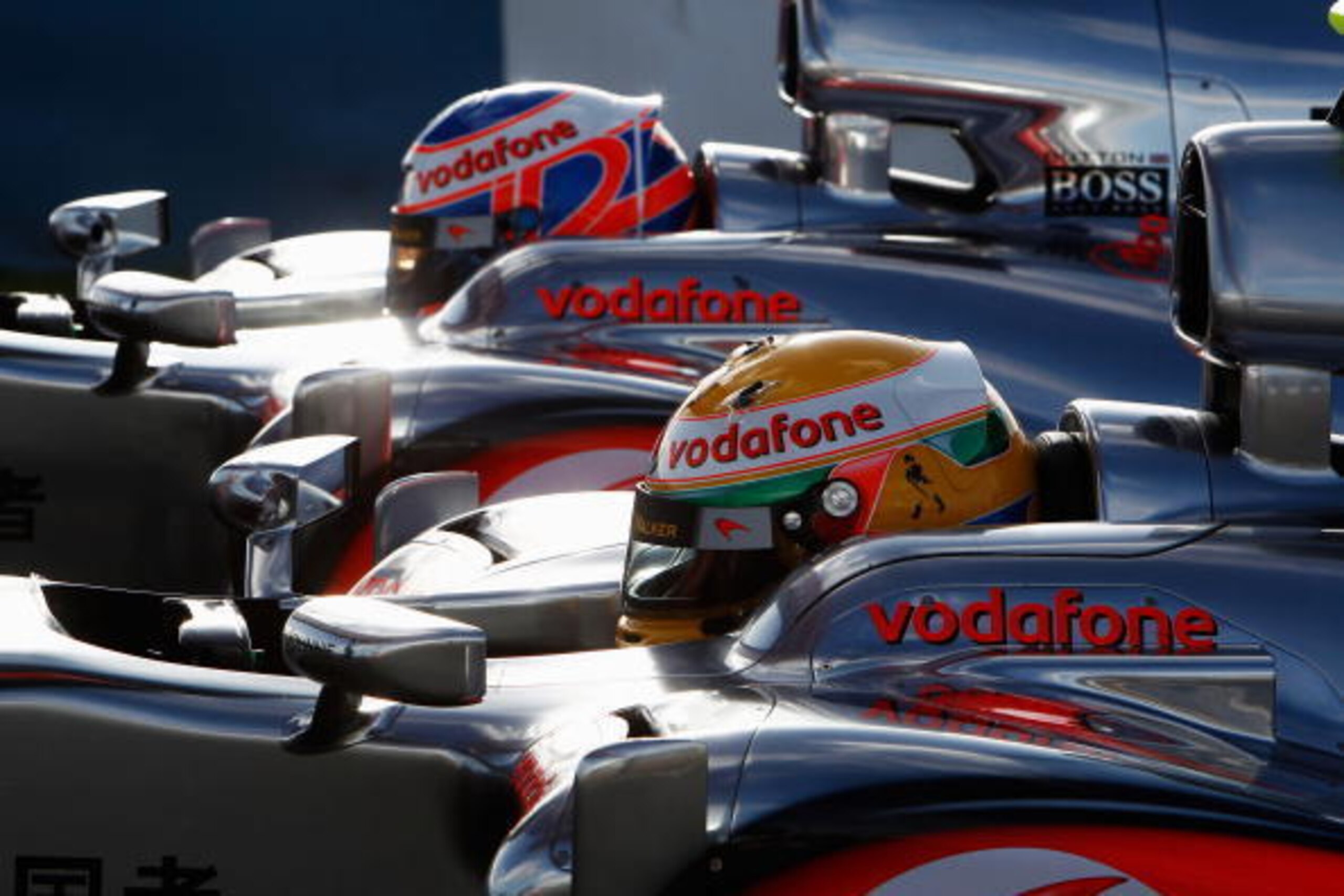 JEREZ DE LA FRONTERA, SPAIN - FEBRUARY 08:  Jenson Button (top) of Great Britain and McLaren Mercedes and Lewis Hamilton (bottom) of Great Britain and McLaren Mercedes sit side by side in their cars during winter testing at the Circuito De Jerez on Februa