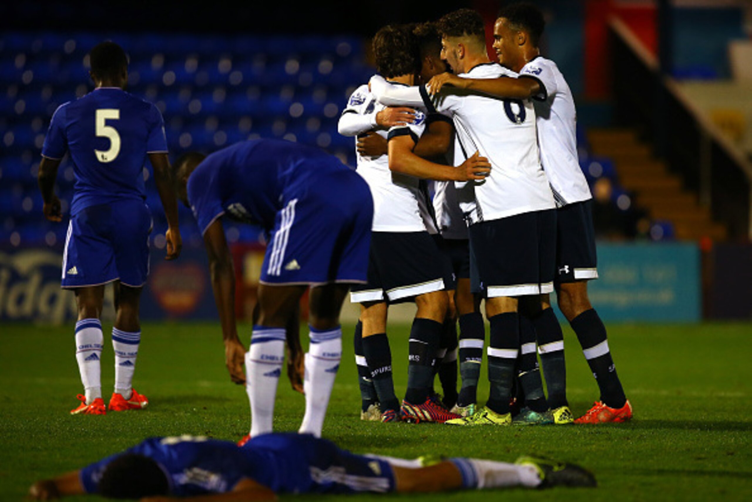 ALDERSHOT, ENGLAND - OCTOBER 30: Shayon Harrison of Spurs celebrates scoring the teams first goal with team mates during the Barclays U21 Premier League match between Tottenham Hotspur U21 and Chelsea U21at The Recreation Ground on October 30, 2015 in Ald