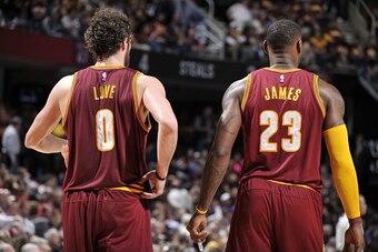 CLEVELAND, OH - OCTOBER 30:  Kevin Love #0 of the Cleveland Cavaliers and LeBron James #23 of the Cleveland Cavaliers stand on the court against the Miami Heat on October 30, 2015 at Quicken Loans Arena in Cleveland, Ohio. NOTE TO USER: User expressly ack