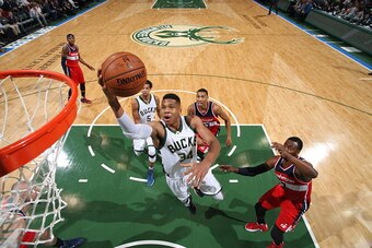 Milwaukee, WI - OCTOBER 30:  Giannis Antetokounmpo #34 of the Milwaukee Bucks shoots the ball against the Washington Wizardsduring a preseason game on October 30, 2015 at the BMO Harris Bradley Center in Milwaukee, Wisconsin. NOTE TO USER: User expressly 