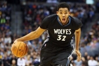 Oct 30, 2015; Denver, CO, USA; Minnesota Timberwolves center Karl-Anthony Towns (32) drives to the basket during the first half against the Denver Nuggets at Pepsi Center. Mandatory Credit: Chris Humphreys-USA TODAY Sports