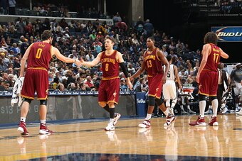 MEMPHIS, TN - OCTOBER 28:  Matthew Dellavedova #8 of the Cleveland Cavaliers shakes hands with Kevin Love #0 of the Cleveland Cavaliers during the game against the Memphis Grizzlies on October 28, 2015 at FedExForum in Memphis, Tennessee. NOTE TO USER: Us