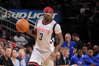 HOUSTON, TX - OCTOBER 30: Ty Lawson #3 of the Houston Rockets drives to the basket against the Houston Rockets during the game on October 30, 2015 at Toyota Center in Houston, Texas. NOTE TO USER: User expressly acknowledges and agrees that, by downloadin