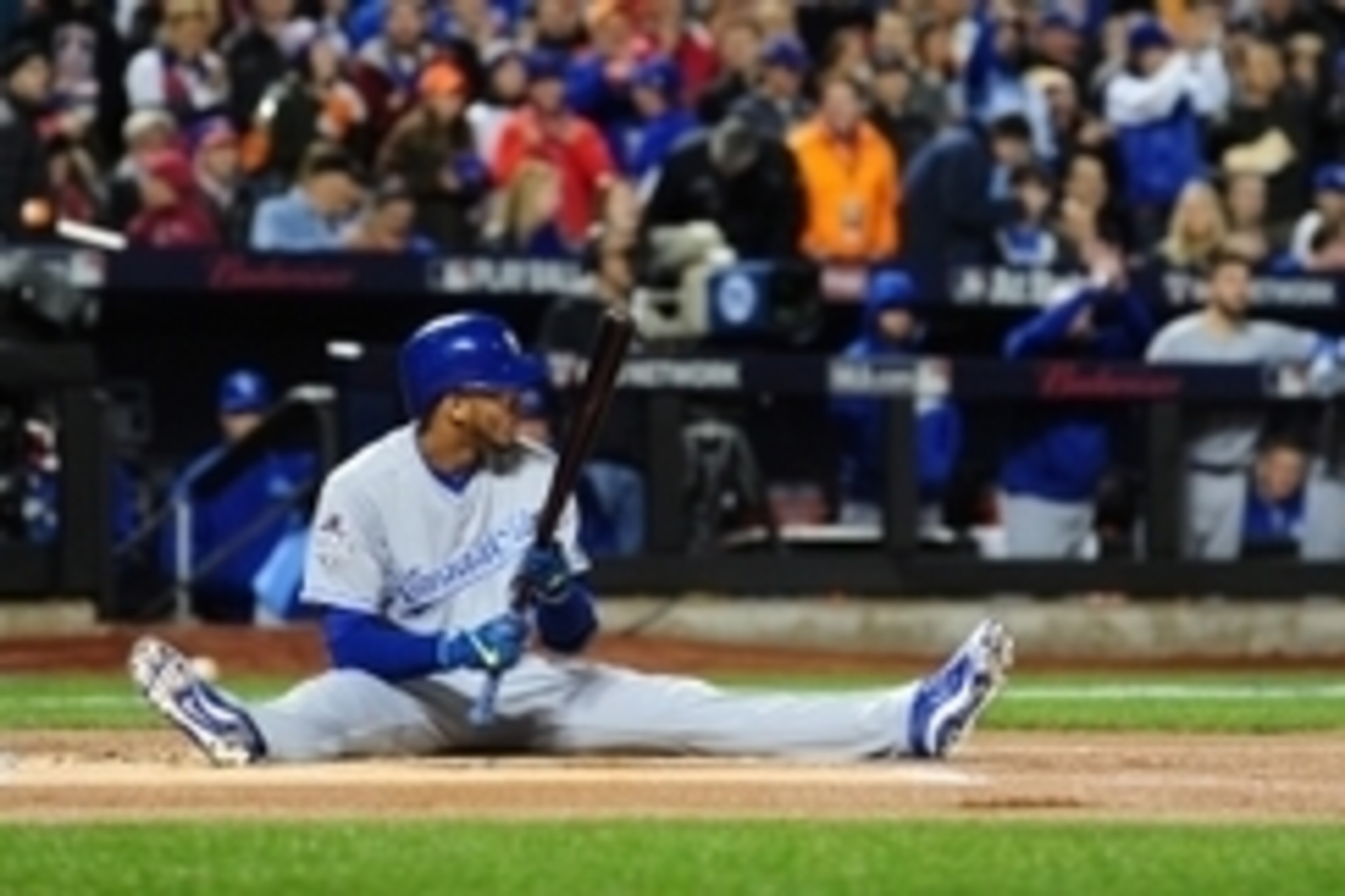 Oct 30, 2015; New York City, NY, USA; Kansas City Royals shortstop Alcides Escobar is knocked back by a pitch in the first inning against the New York Mets in game three of the World Series at Citi Field. Mandatory Credit: Jeff Curry-USA TODAY Sports