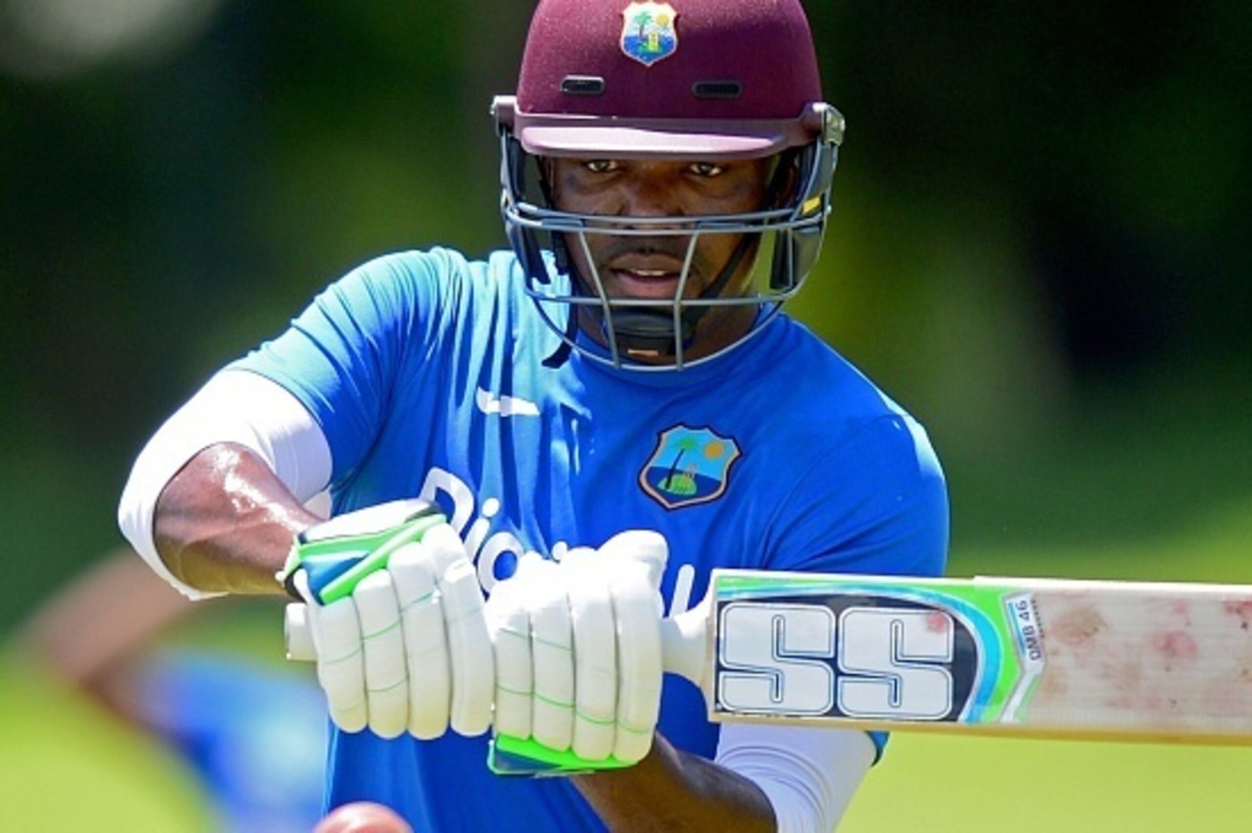 West Indies cricketer Darren Bravo bats during a practice session at The Sinhalese Sports Club (SSC) Ground in Colombo on October 8, 2015, ahead of a warm-up match against a Sri Lankan President's XI to be played from October 9 - 11. West Indies are due t