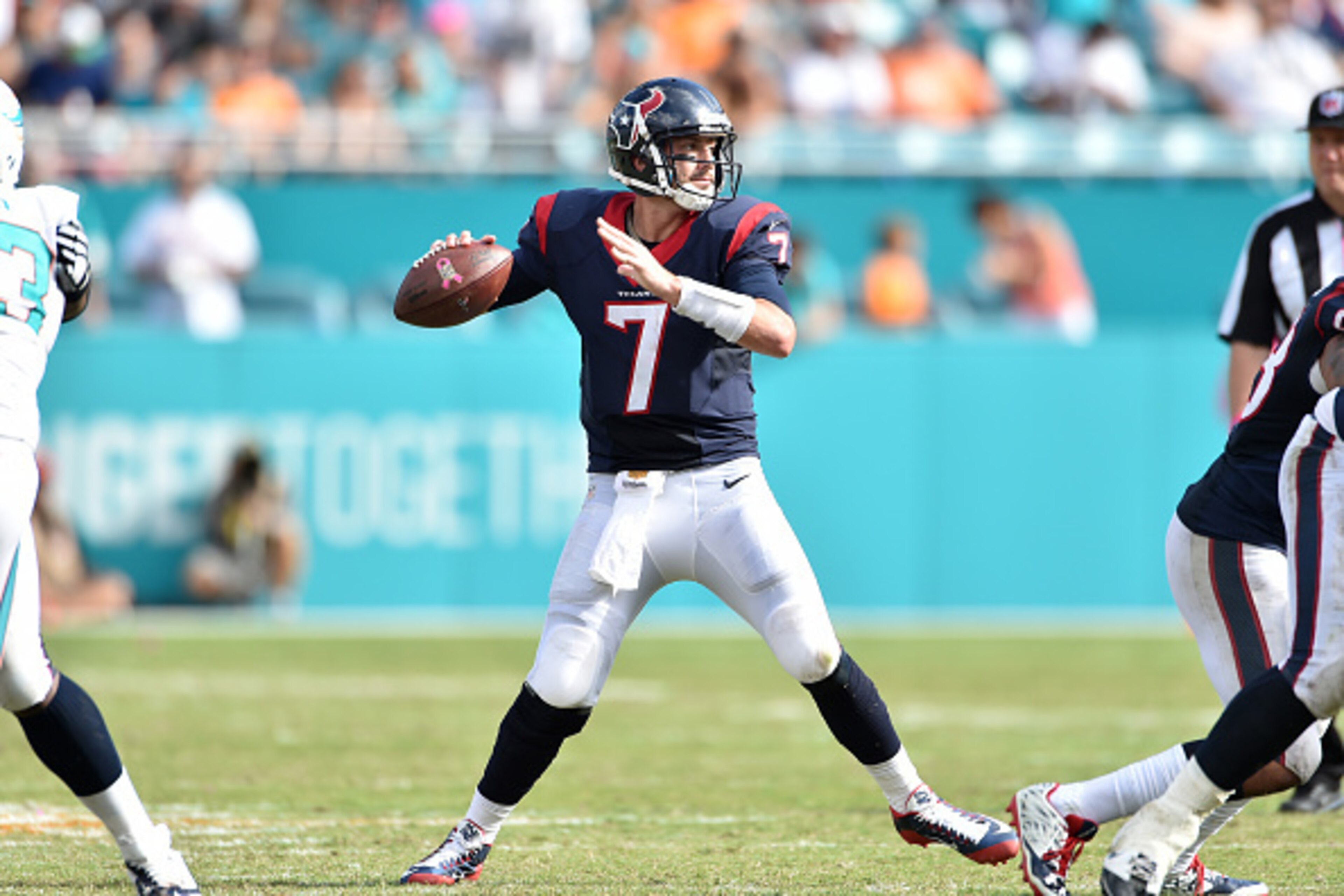 MIAMI GARDENS, FL - OCTOBER 25:  Quarterback Brian Hoyer #7 of the Houston Texans looks for a receiver during a NFL game against the Miami Dolphins at Sun Life Stadium on October 25, 2015 in Miami Gardens, Florida.  (Photo by Ronald C. Modra/Sports Imager