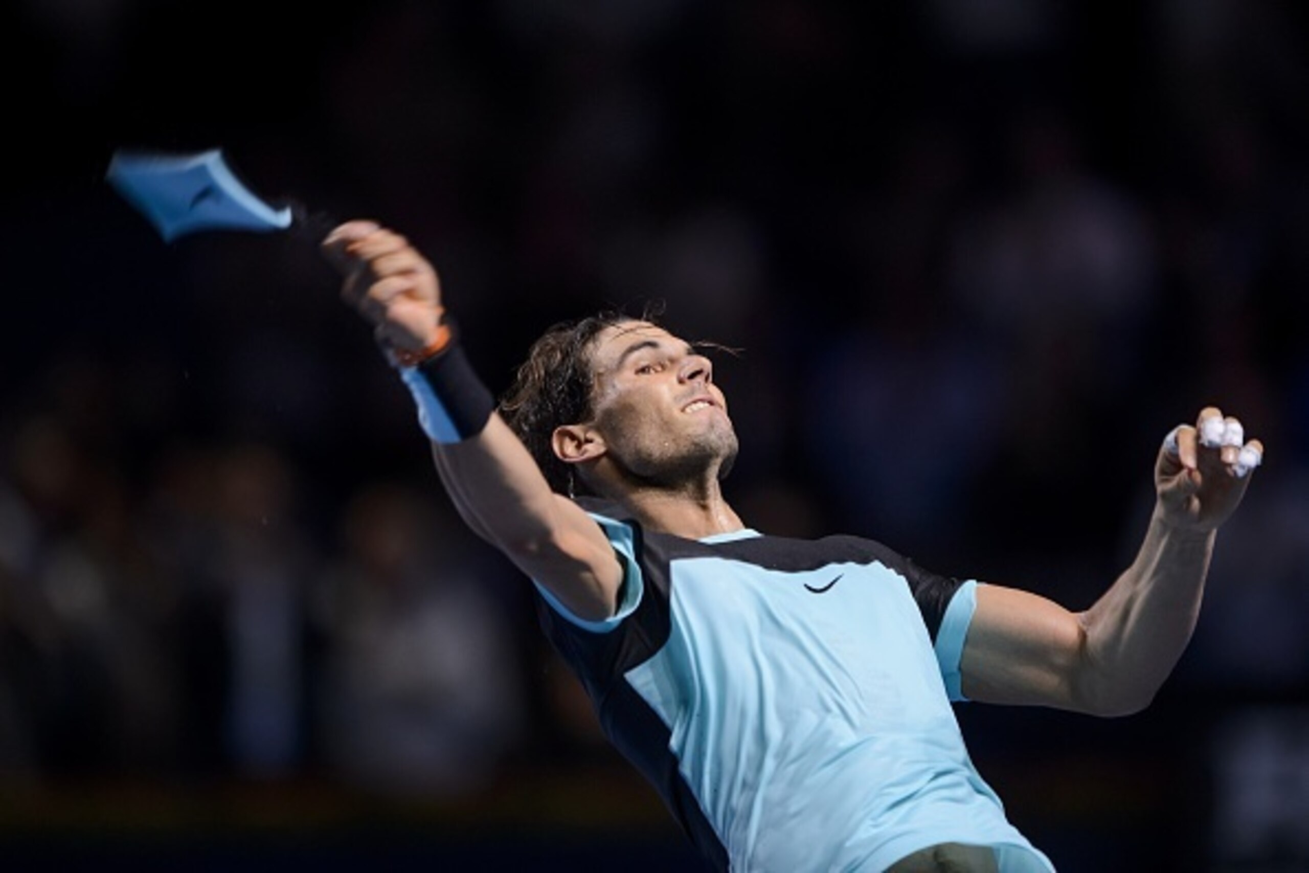 Spain's Rafael Nadal throws his wristband to the public after his victory during his semi-final match against France's Richard Gasquet at the Swiss Indoors tennis tournament on October 31, 2015 in Basel, northern Switzerland. AFP PHOTO / FABRICE COFFRINI Spain's Rafael Nadal throws his wristband to the public after his victory during his semi-final match against France's Richard Gasquet at the Swiss Indoors tennis tournament on October 31, 2015 in Basel, northern Switzerland. AFP PHOTO / FABRICE COFFRINI