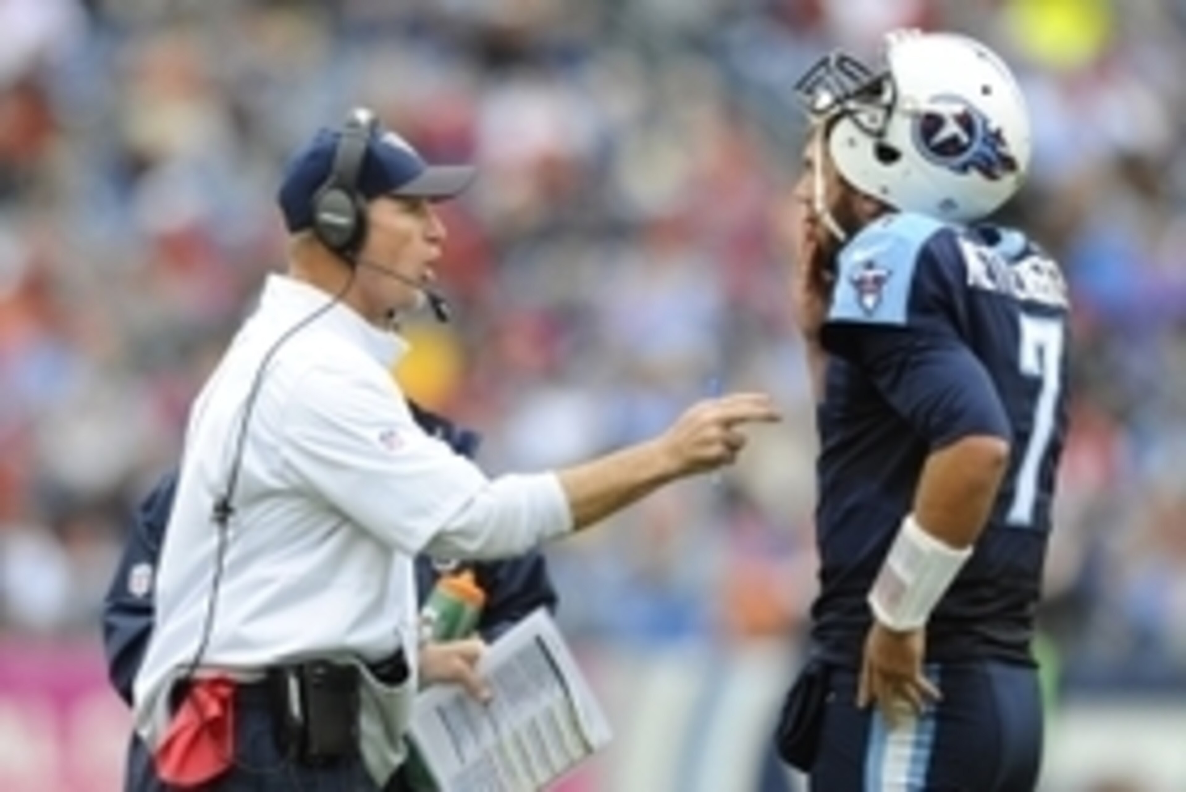 Oct 25, 2015; Nashville, TN, USA; Tennessee Titans head coach Ken Whisenhunt talks with quarterback Zach Mettenberger (7) during the first half against the Atlanta Falcons at Nissan Stadium. Mandatory Credit: Christopher Hanewinckel-USA TODAY Sports