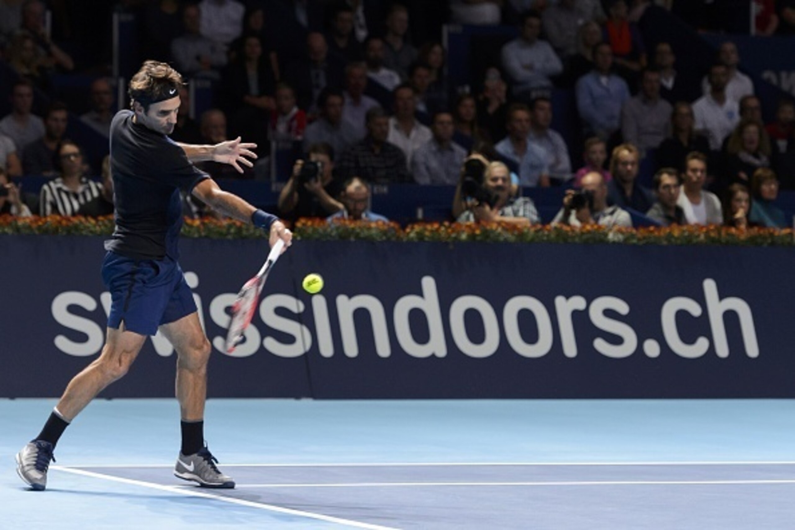 Switzerland's Roger Federer returns a ball to Jack Sock of the US during their semi-final match at the Swiss Indoors tennis tournament on October 31, 2015 in Basel, northern Switzerland. AFP PHOTO / FABRICE COFFRINI (Photo credit should read FABRI Switzerland's Roger Federer returns a ball to Jack Sock of the US during their semi-final match at the Swiss Indoors tennis tournament on October 31, 2015 in Basel, northern Switzerland. AFP PHOTO / FABRICE COFFRINI (Photo credit should read FABRI