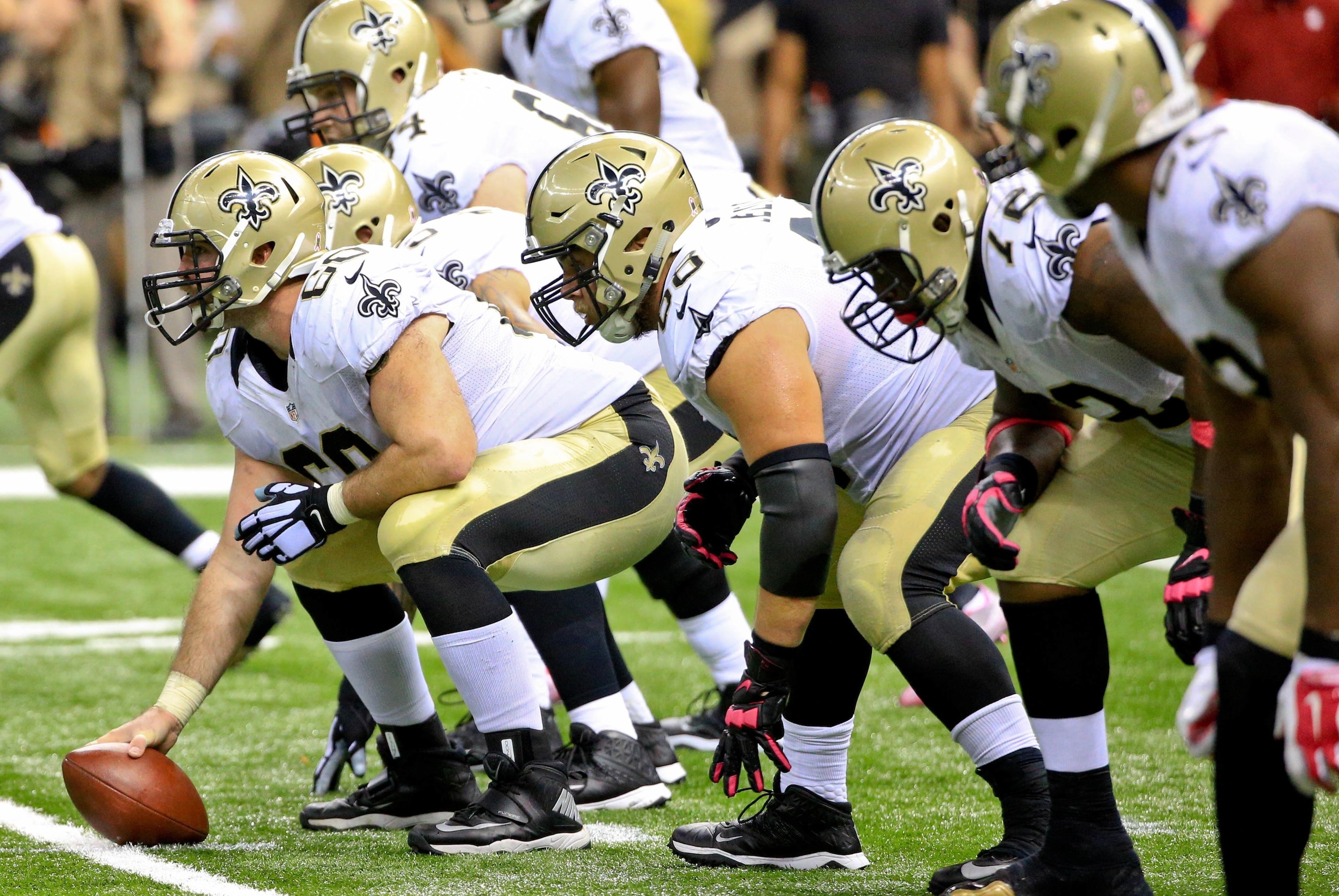 Oct 4, 2015; New Orleans, LA, USA; New Orleans Saints center Max Unger (60) during overtime of a game against the Dallas Cowboys at the Mercedes-Benz Superdome. The Saints defeated the Cowboys 26-20 in overtime. Mandatory Credit: Derick E. Hingle-USA TODA