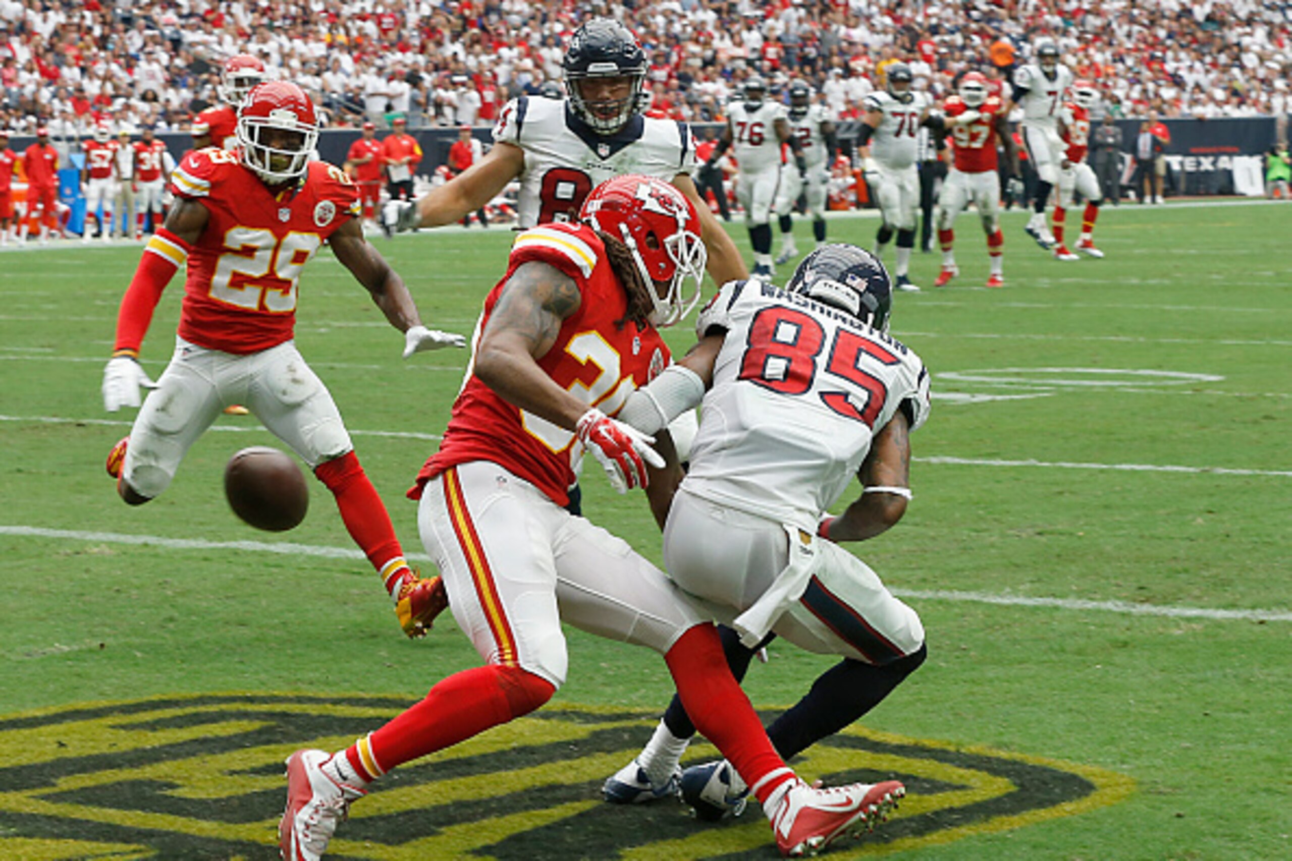HOUSTON, TX - SEPTEMBER 13: Nate Washington #85 of the Houston Texans drops a pass while being covered by Jamell Fleming #30 of the Kansas City Chiefs in the third quarter in a NFL game on September 13, 2015 at NRG Stadium in Houston, Texas. (Photo by Bob