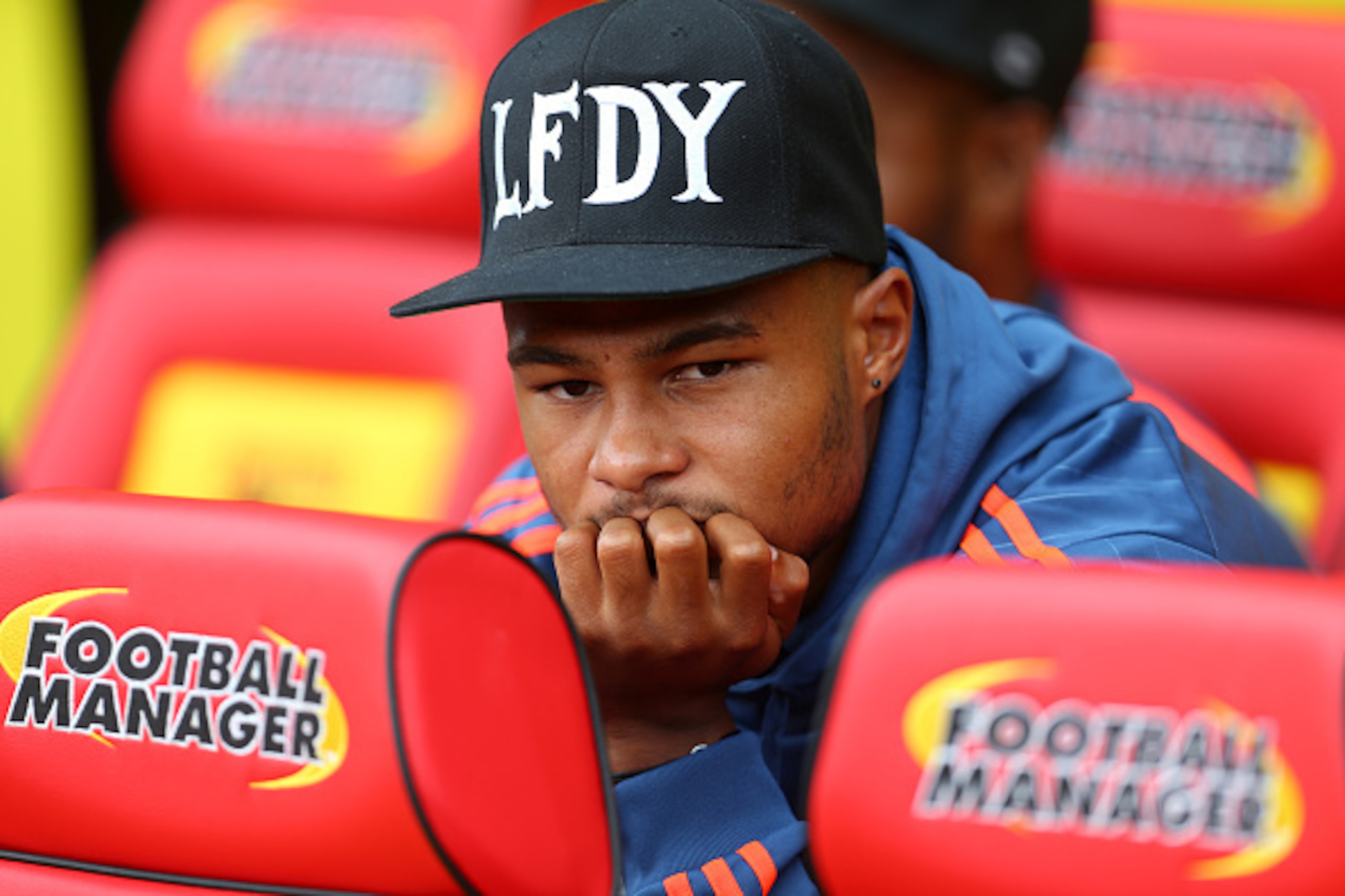 WATFORD, ENGLAND - AUGUST 15:  Serge Gnabry of West Bromwich Albion on the bench before the Barclays premier League match between Watford and West Bromwich Albion at Vicarage Road on August 15, 2015 in Watford, England.  (Photo by Catherine Ivill - AMA/Ge