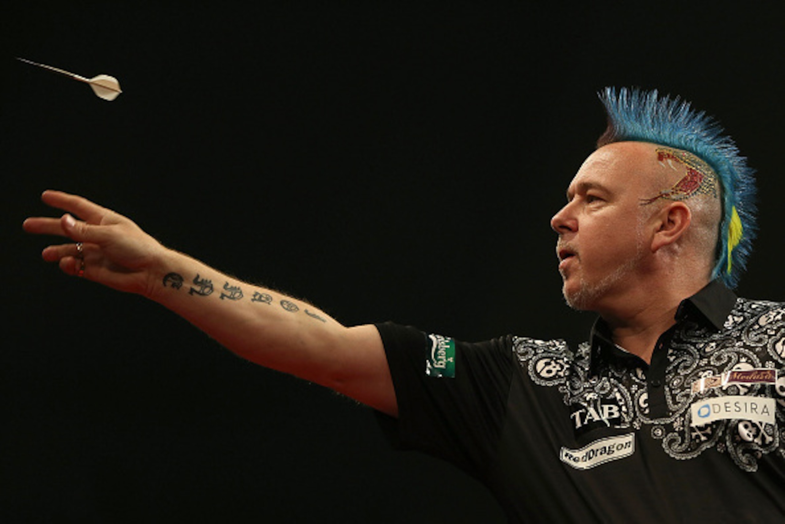 AUCKLAND, NEW ZEALAND - AUGUST 29:  Peter Wright in action during the Auckland Darts Masters at The Trusts Arena on August 29, 2015 in Auckland, New Zealand.  (Photo by Michael Bradley/Getty Images)