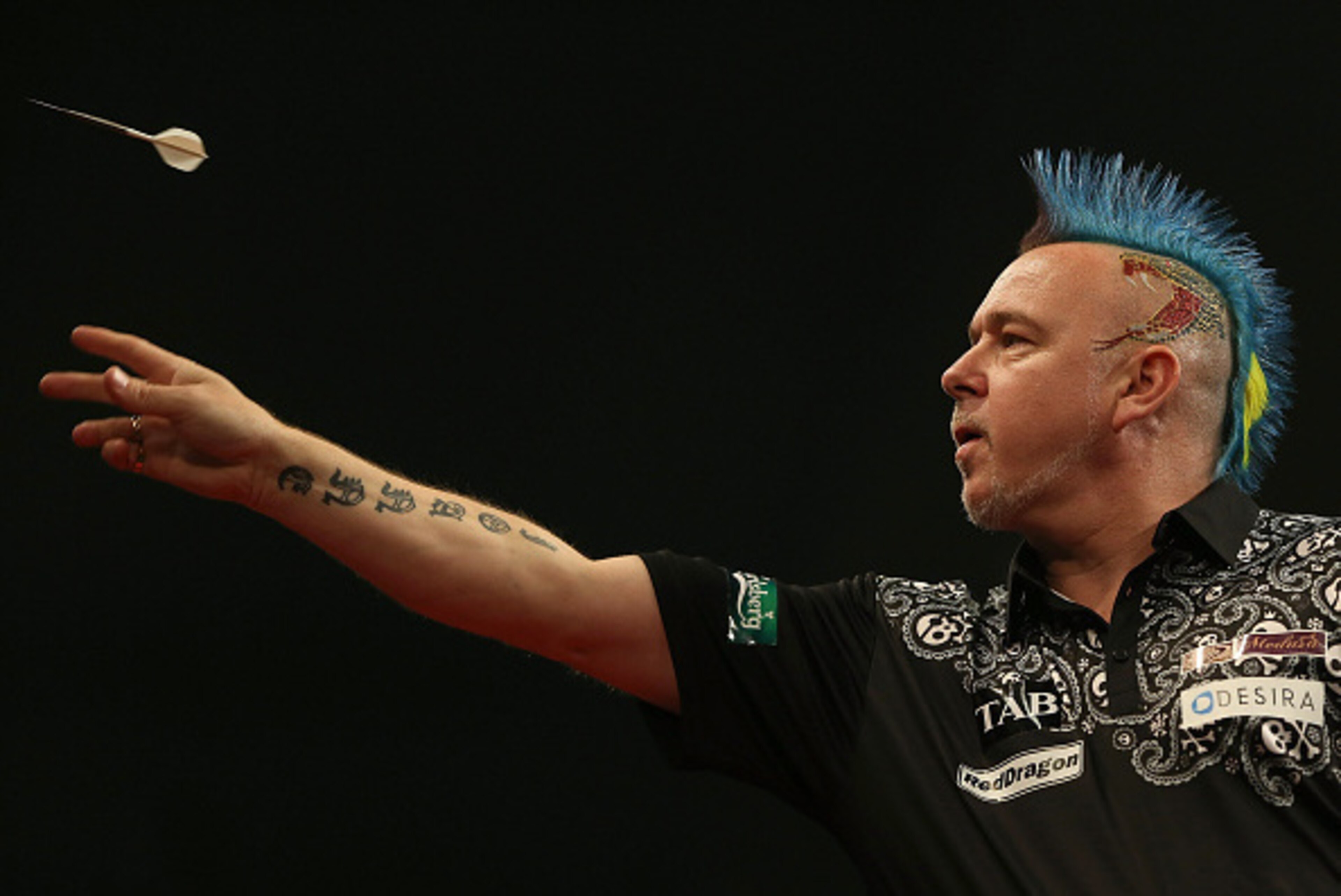 AUCKLAND, NEW ZEALAND - AUGUST 29:  Peter Wright in action during the Auckland Darts Masters at The Trusts Arena on August 29, 2015 in Auckland, New Zealand.  (Photo by Michael Bradley/Getty Images)