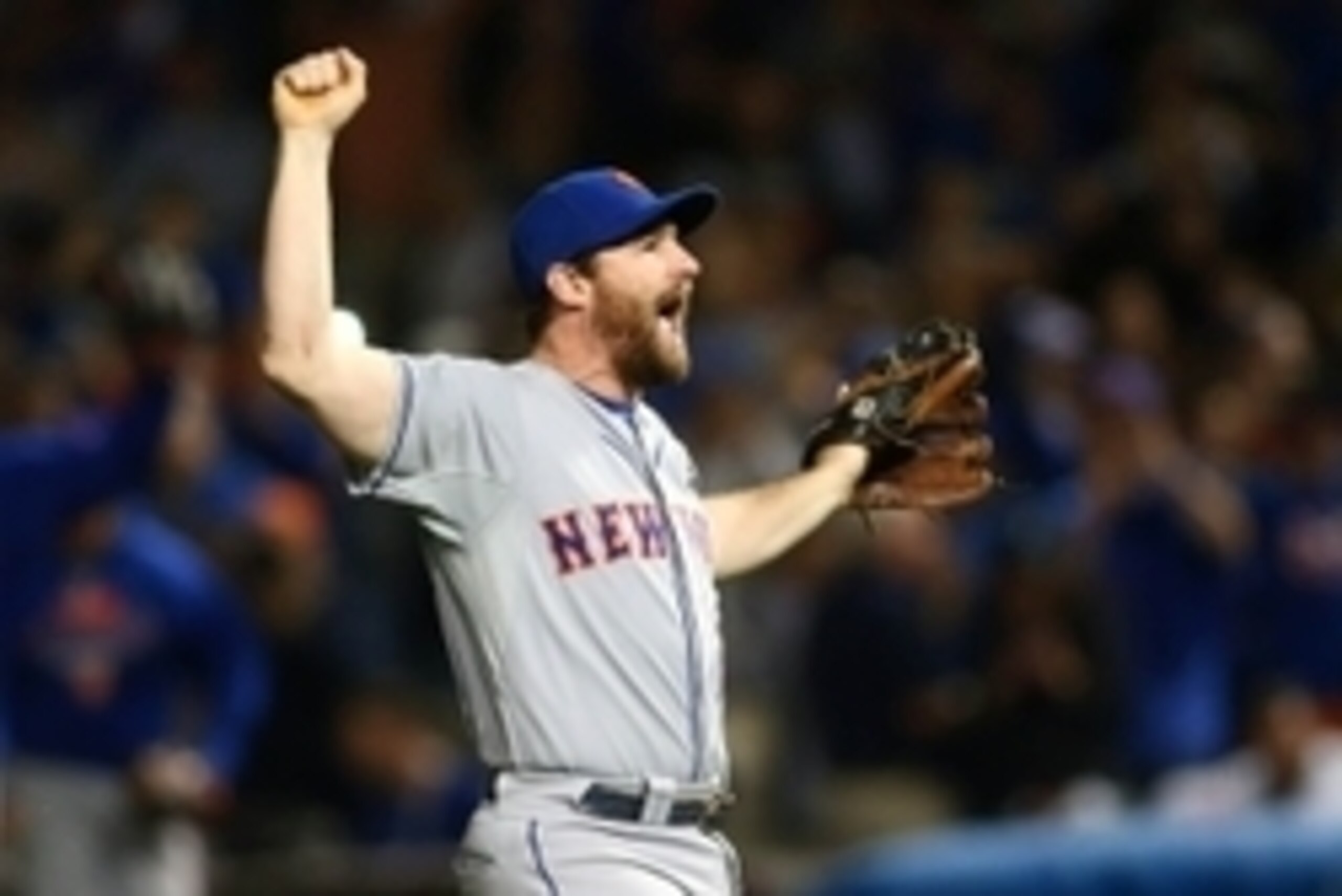 October 20, 2015; Chicago, IL, USA; New York Mets second baseman Daniel Murphy (28) celebrates the 8-3 victory against the Chicago Cubs in game four of the NLCS at Wrigley Field. Mandatory Credit: Jerry Lai-USA TODAY Sports