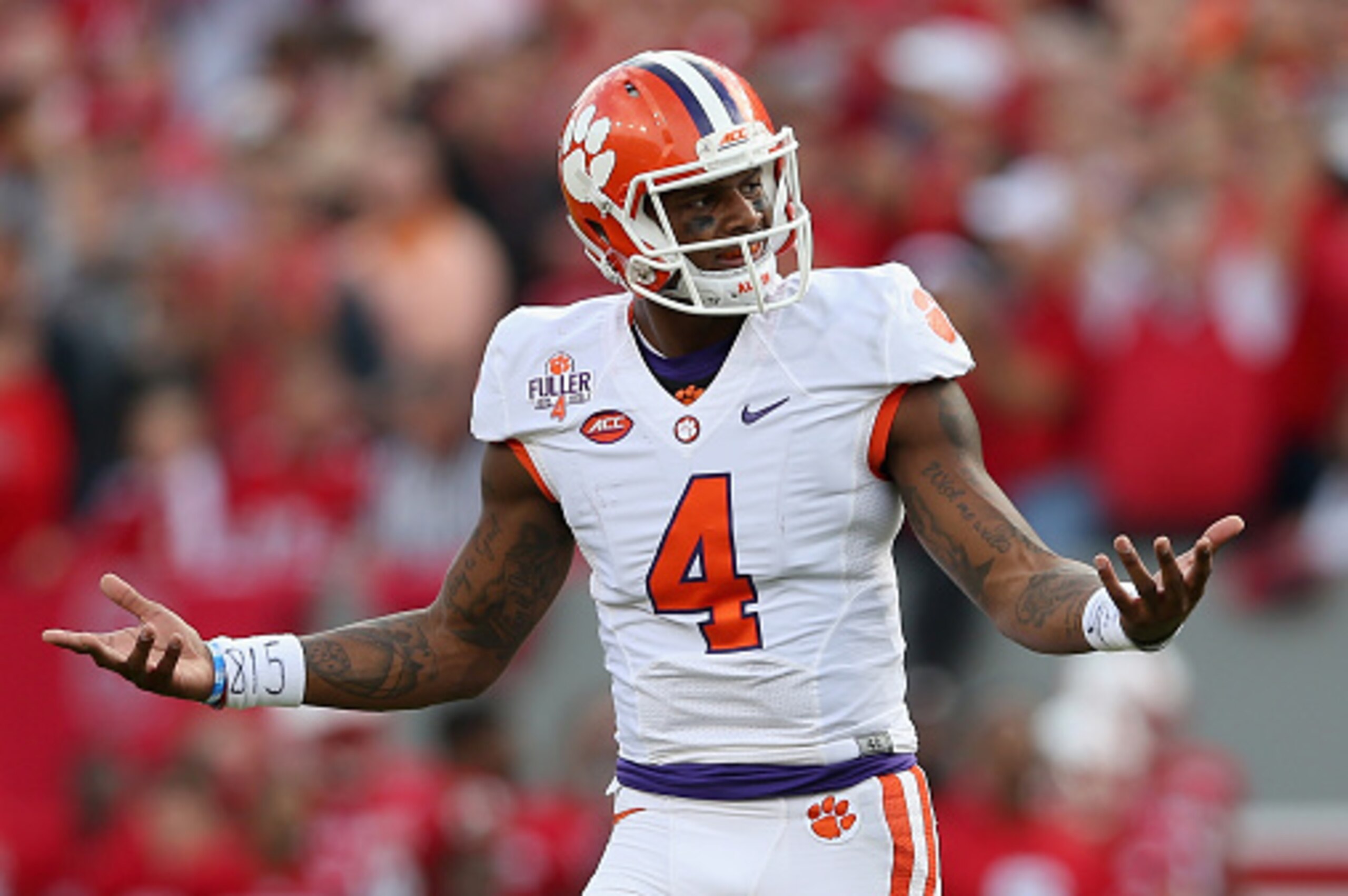 RALEIGH, NC - OCTOBER 31:  Deshaun Watson #4 of the Clemson Tigers reacts after a play during their game against the North Carolina State Wolfpack at Carter-Finley Stadium on October 31, 2015 in Raleigh, North Carolina.  (Photo by Streeter Lecka/Getty Ima
