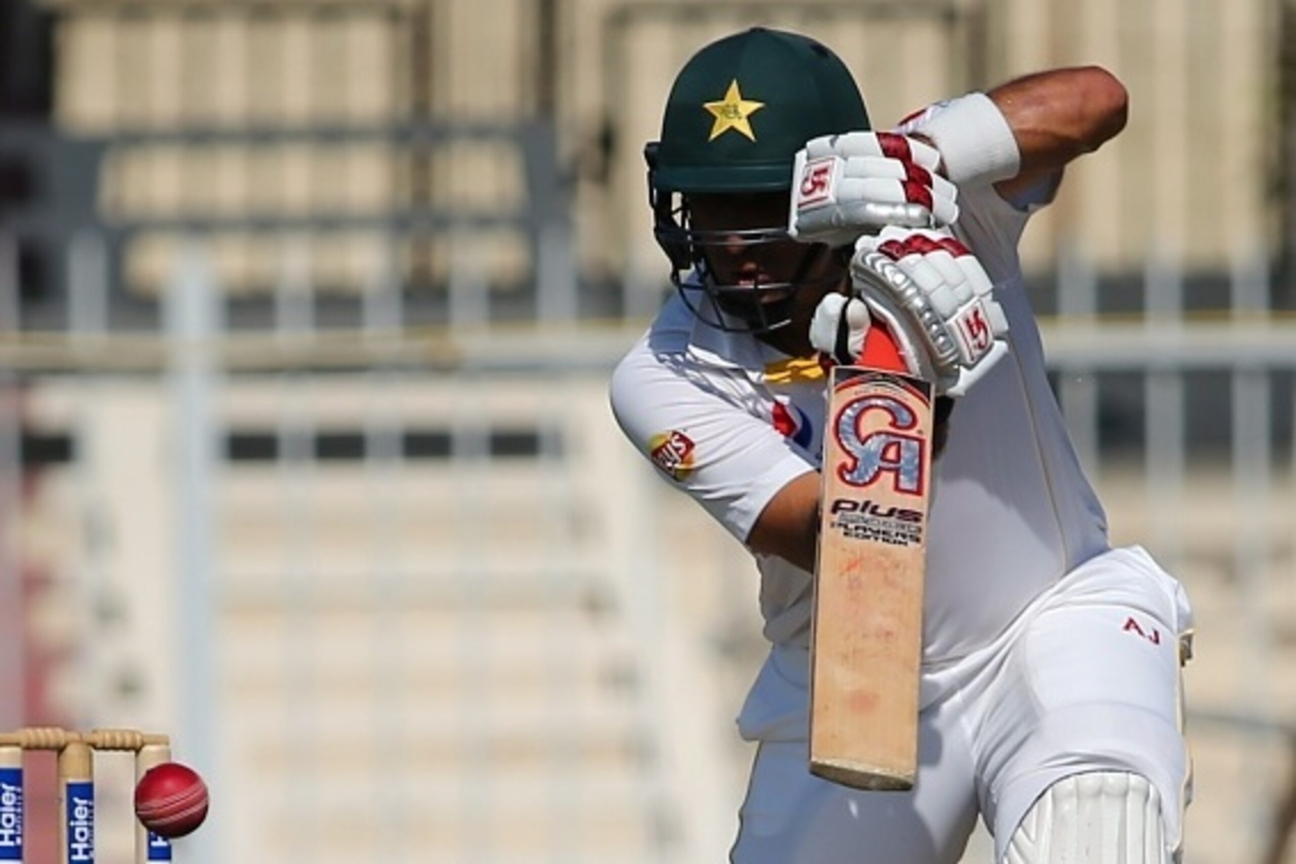Pakistan's Misbah Ul-Haq plays a shot during the first day of the third Test cricket match between Pakistan and England in the Gulf Emirate of Sharjah on November 1, 2015. AFP PHOTO / MARWAN NAAMANI        (Photo credit should read MARWAN NAAMANI/AFP/Gett