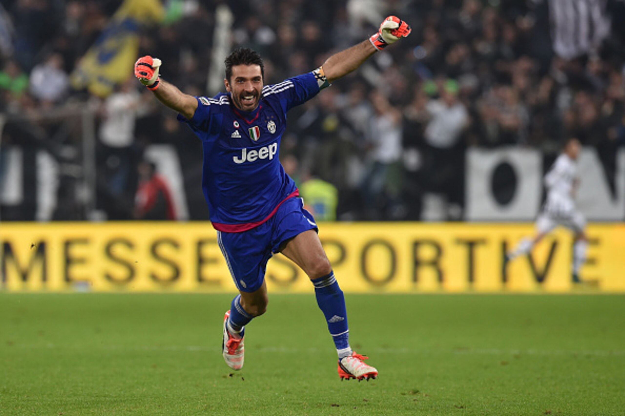 TURIN, ITALY - OCTOBER 31:  Gianluigi Buffon of Juventus FC celebrates after his team-mate  Juan Cuadrado scored the victory goal during the Serie A match between Juventus FC and Torino FC at Juventus Arena on October 31, 2015 in Turin, Italy.  (Photo by 