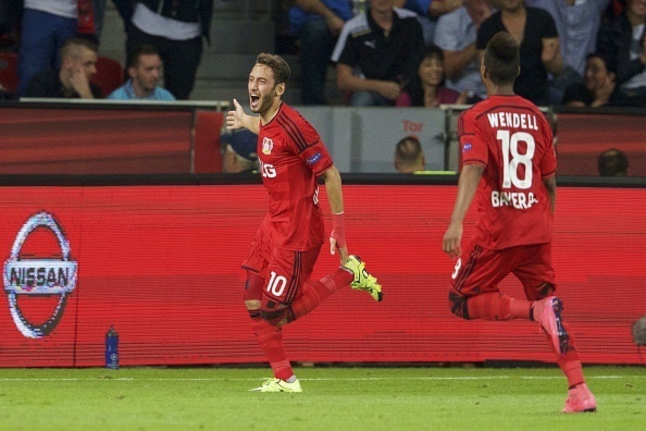 (L-R) Hakan Calhanoglu of Bayer Leverkusen, Wendell of Bayer Leverkusen during the UEFA Champions League play-offs match between Bayer Leverkusen and Lazio Roma on August 26, 2015 at the BayArena in Leverkusen, Germany.(Photo by VI Images via Getty Images