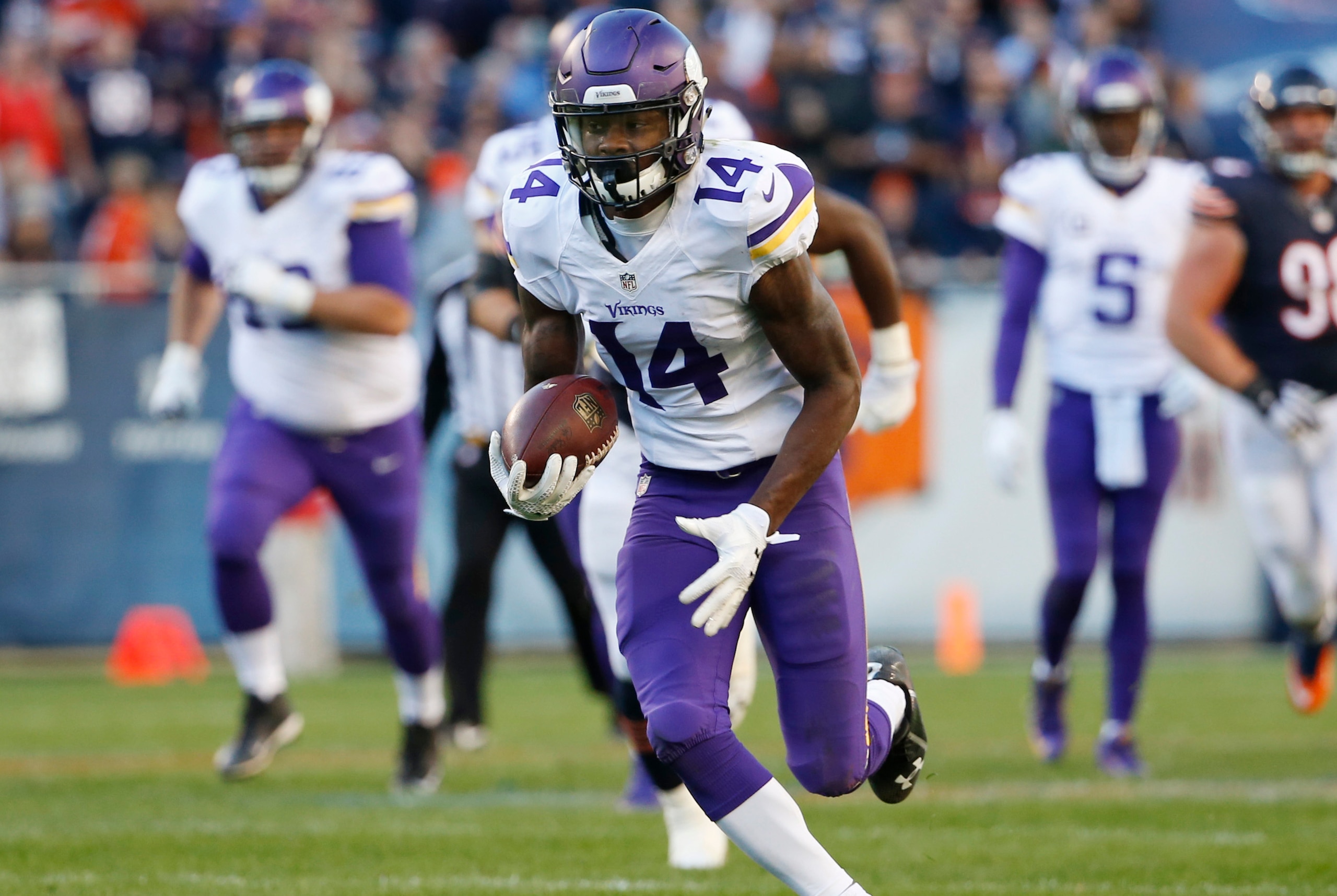 Nov 1, 2015; Chicago, IL, USA; Minnesota Vikings wide receiver Stefon Diggs (14) carries the ball to score a touchdown against the Chicago Bears during the fourth quarter at Soldier Field. The Vikings won 23-20. Mandatory Credit: Kamil Krzaczynski-USA TOD