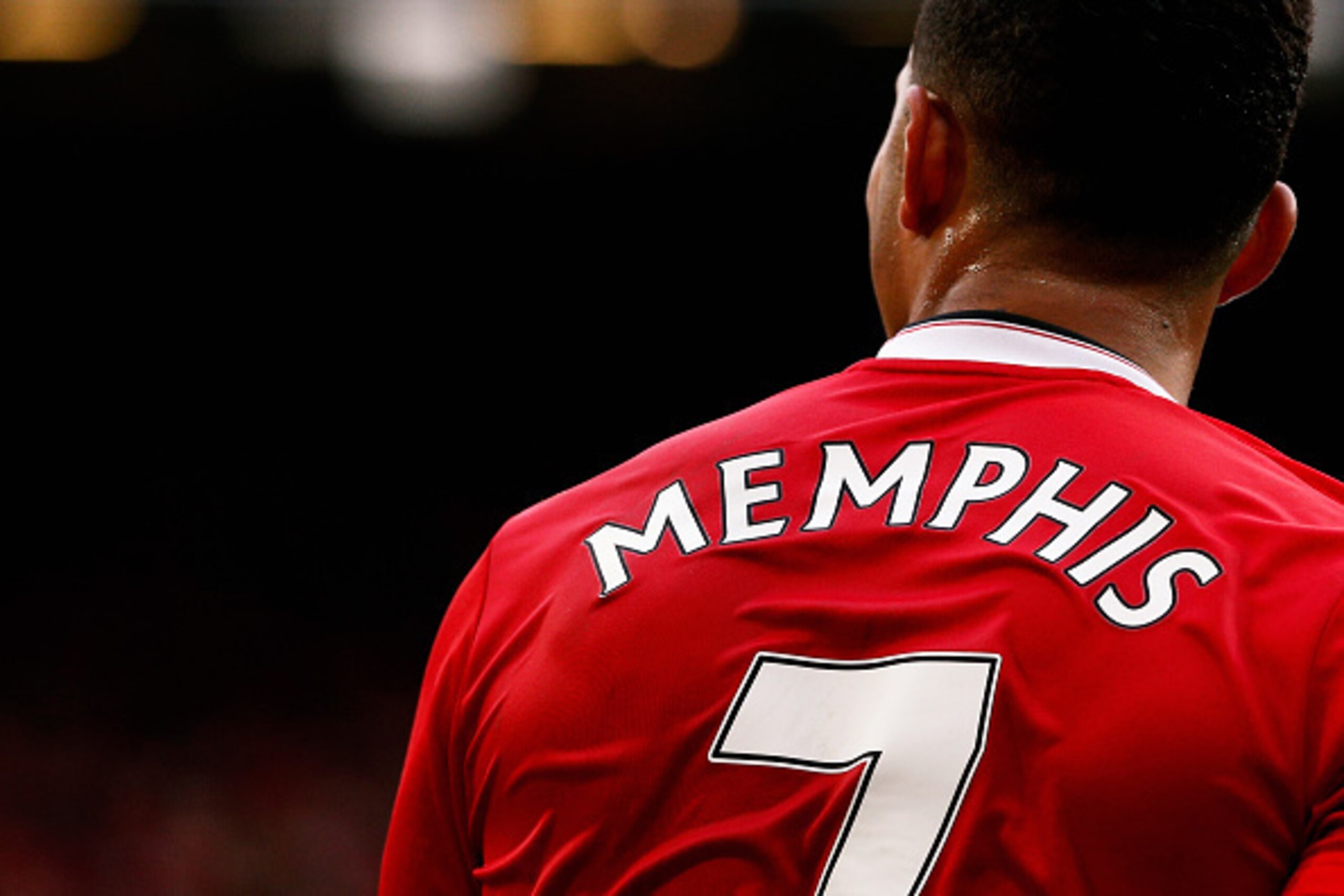 MANCHESTER, ENGLAND - SEPTEMBER 26:  A detailed look and the shirt and number 7 worn by Memphis Depay of Manchester United during the Barclays Premier League match between Manchester United and Sunderland at Old Trafford on September 26, 2015 in Mancheste