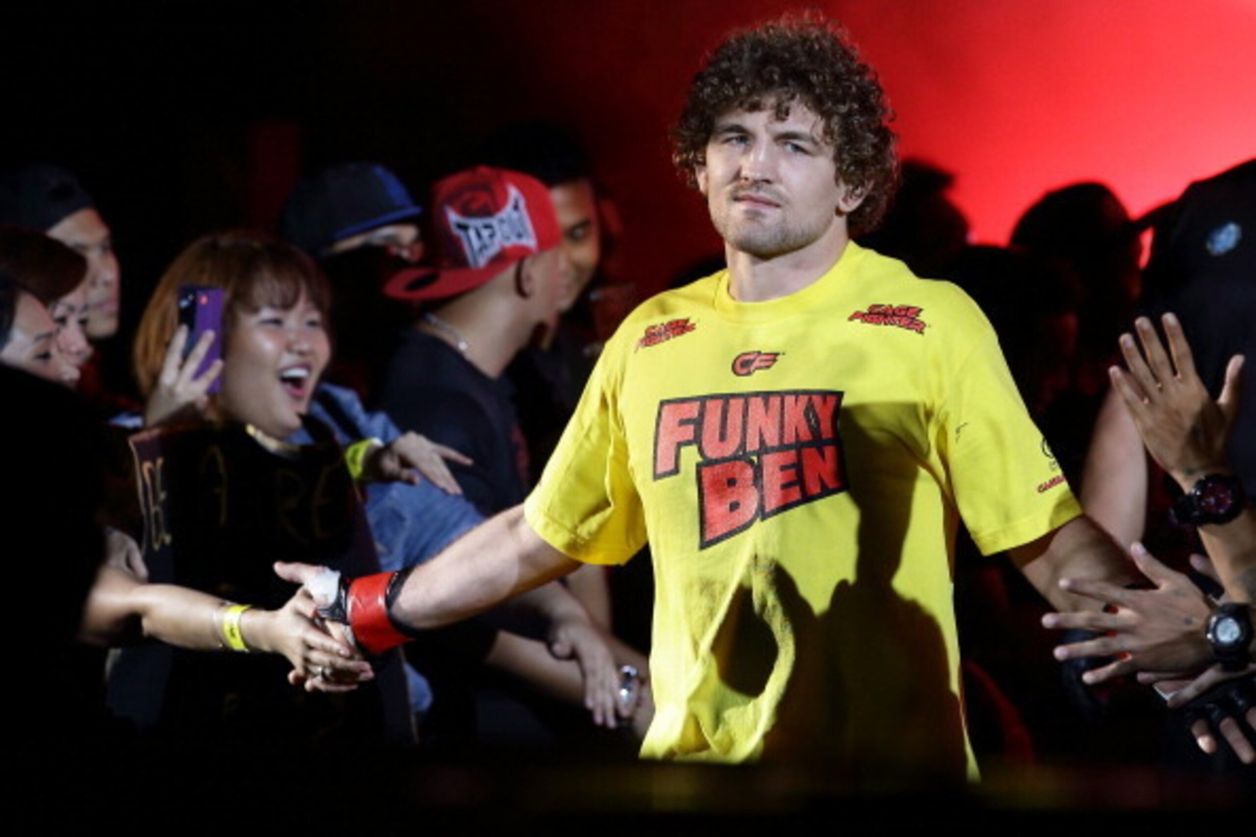 SINGAPORE - MAY 30:  Ben Askren of United States of America enters the ring during his fight against Bakhtiyar Abbasov of Azerbaijan during OneFC Honor & Glory at Singapore Indoor Stadium on May 30, 2014 in Singapore.  (Photo by Suhaimi Abdullah/Getty Ima
