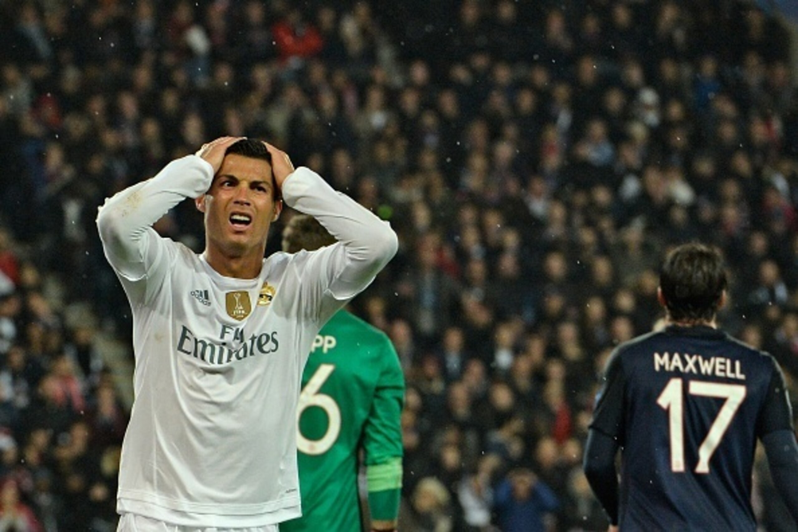 Real Madrid's Portuguese forward Cristiano Ronaldo reacts after missing a goal opportunity during the UEFA Champions League football match Paris Saint-Germain (PSG) vs Real Madrid, on October 21, 2015 at the Parc des Princes stadium in Paris. AFP PHOTO Real Madrid's Portuguese forward Cristiano Ronaldo reacts after missing a goal opportunity during the UEFA Champions League football match Paris Saint-Germain (PSG) vs Real Madrid, on October 21, 2015 at the Parc des Princes stadium in Paris. AFP PHOTO