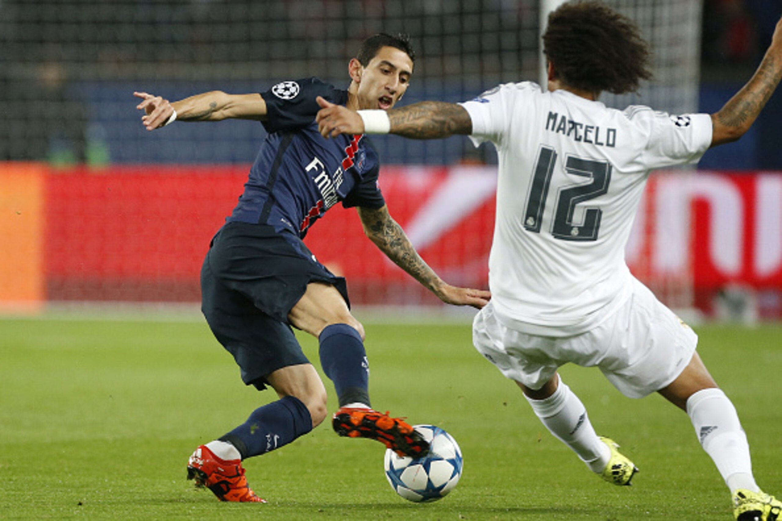 PARIS, FRANCE - OCTOBER 21: Angel Di Maria of PSG and Marcelo of Real Madrid in action during the UEFA Champions League match between Paris Saint-Germain (PSG) and Real Madrid at Parc des Princes stadium on October 21, 2015 in Paris, France. (Photo by Jea