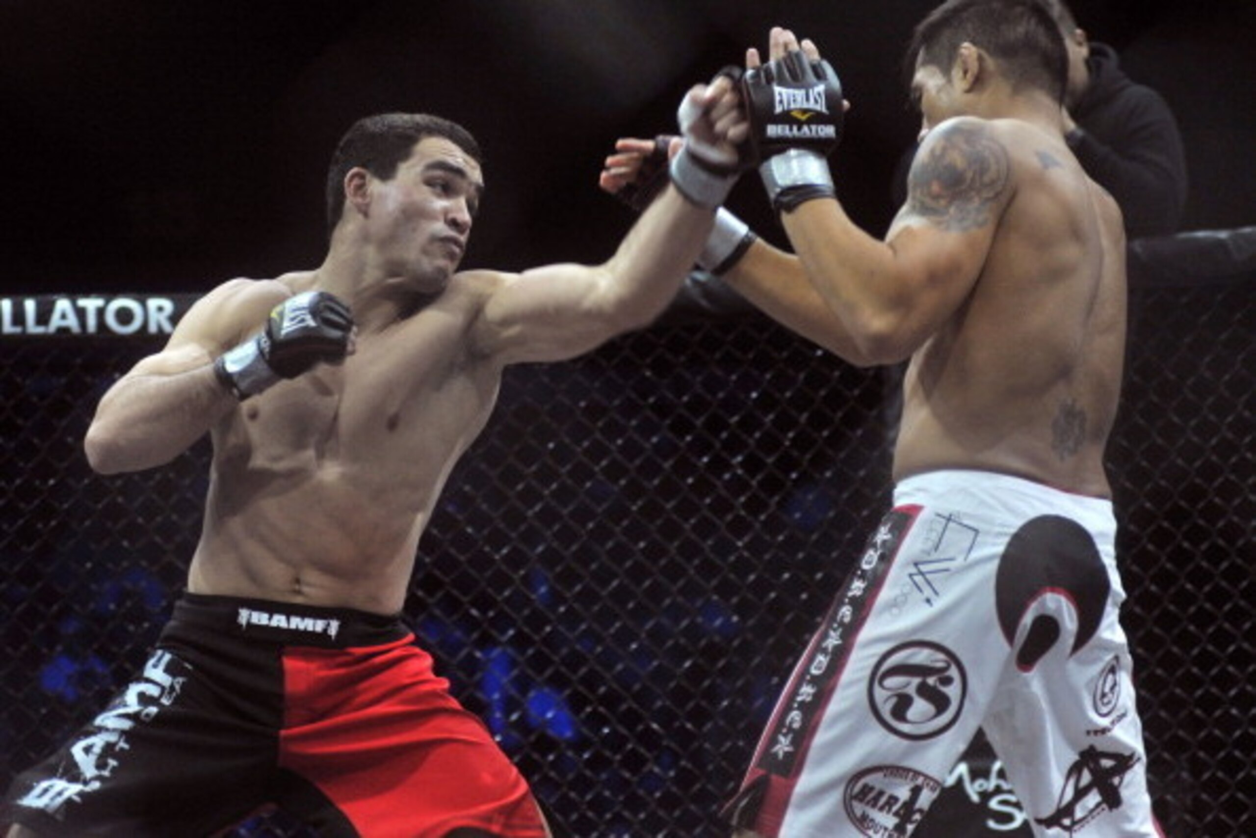 UNCASVILLE, CT - APRIL 02:  Patricky Freire punches Toby Imada at Bellator 39 at the Mohegan Sun Arena on April 2, 2011 in Uncasville, Connecticut.  (Photo by Henry S. Dziekan III/Getty Images)