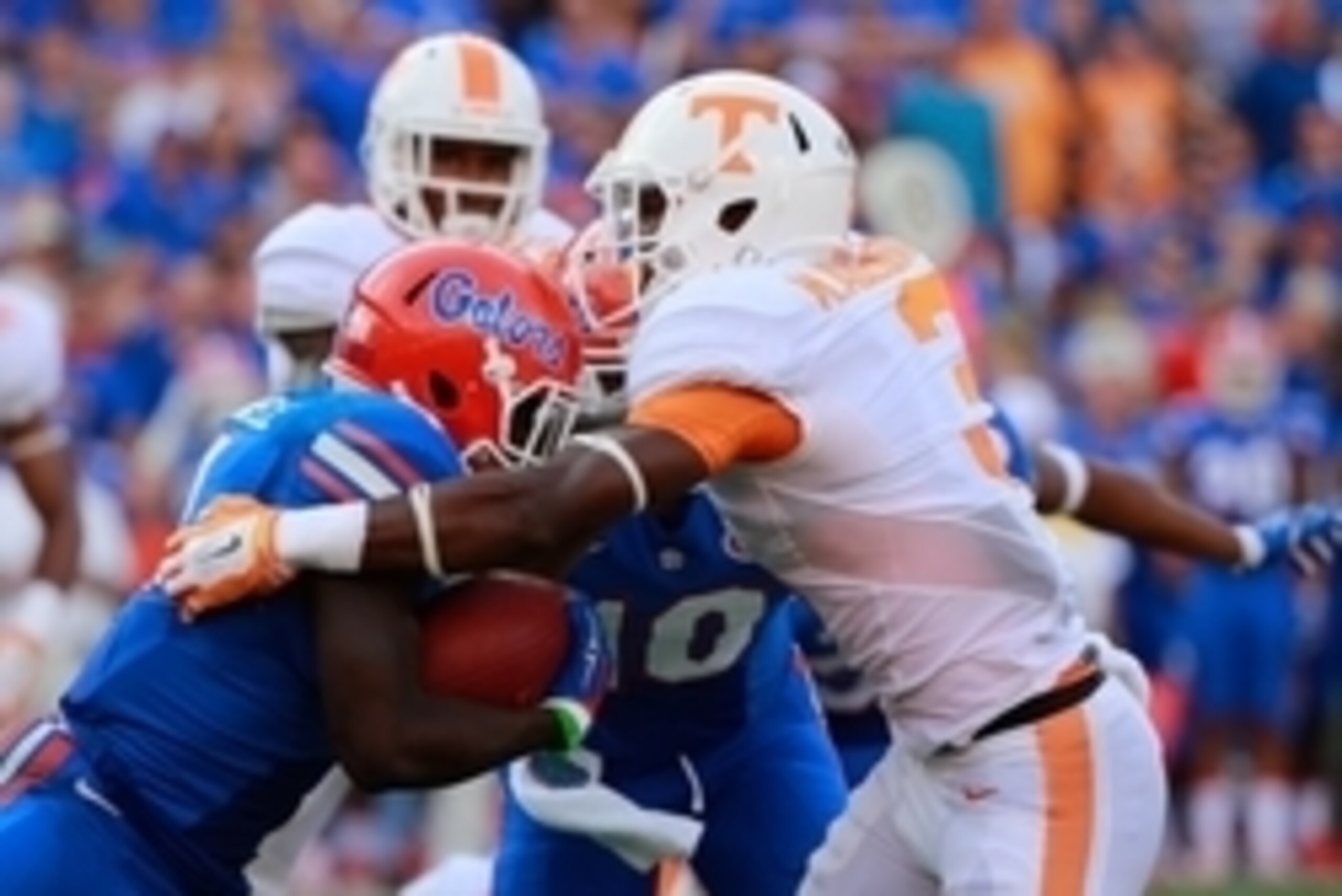 Sep 26, 2015; Gainesville, FL, USA; Tennessee Volunteers defensive back Micah Abernathy (3) tackles Florida Gators wide receiver Brandon Powell (4) during the second half at Ben Hill Griffin Stadium. Florida Gators defeated the Tennessee Volunteers 28-27.
