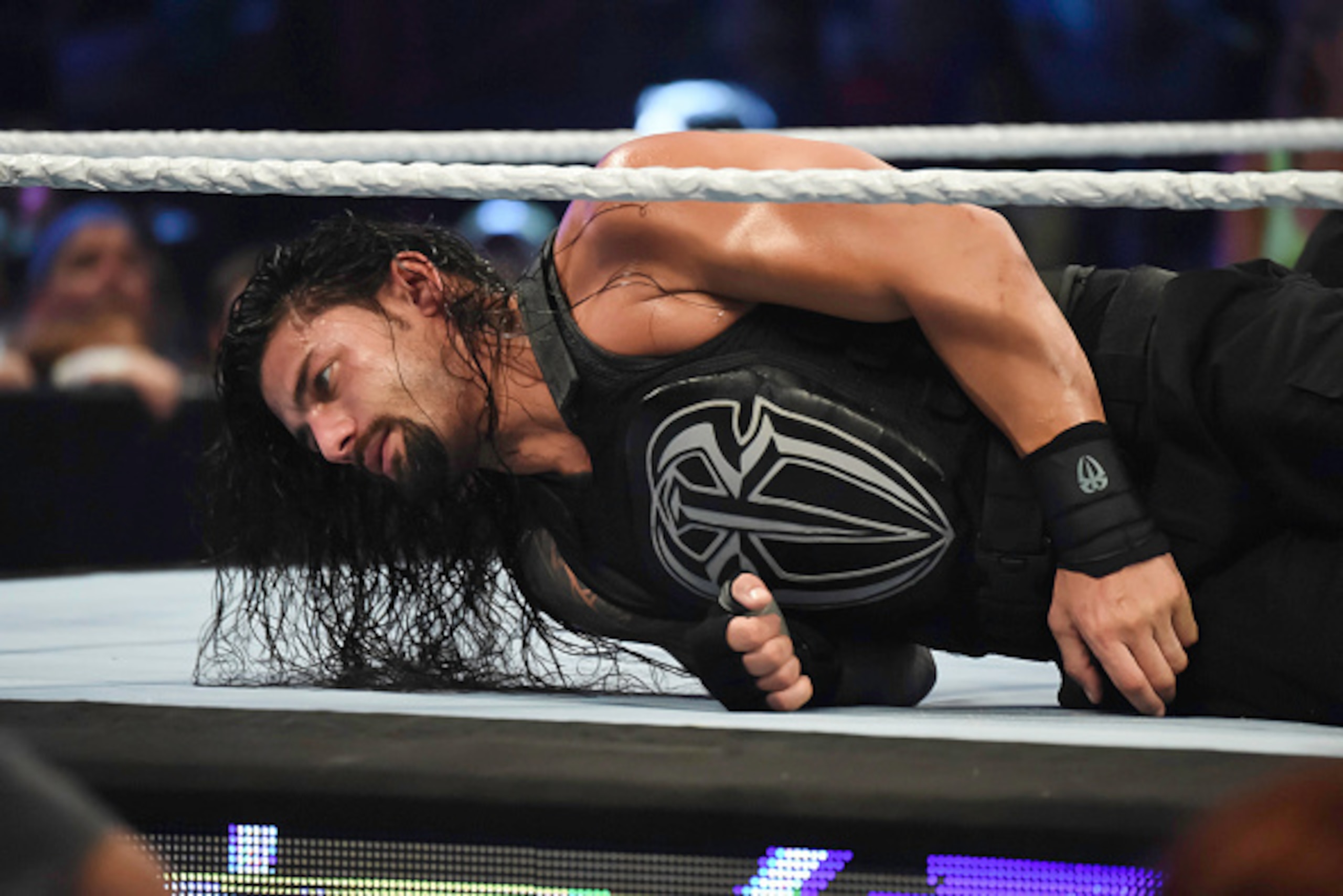 MIAMI, FL- SEPTEMBER 01: Roman Reigns looks on during the WWE Smackdown on September 1, 2015 at the American Airlines Arena in Miami, Florida.  (Photo by Ron ElkmanSports Imagery/Getty Images)