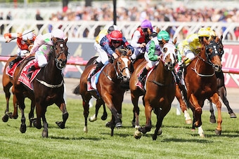 MELBOURNE, AUSTRALIA - NOVEMBER 03:  Michelle Payne (green cap) riding Prince Of Penzance wins race 7 the Emirates Melbourne Cup on Melbourne Cup Day at Flemington Racecourse on November 3, 2015 in Melbourne, Australia.  (Photo by Michael Dodge/Getty Imag