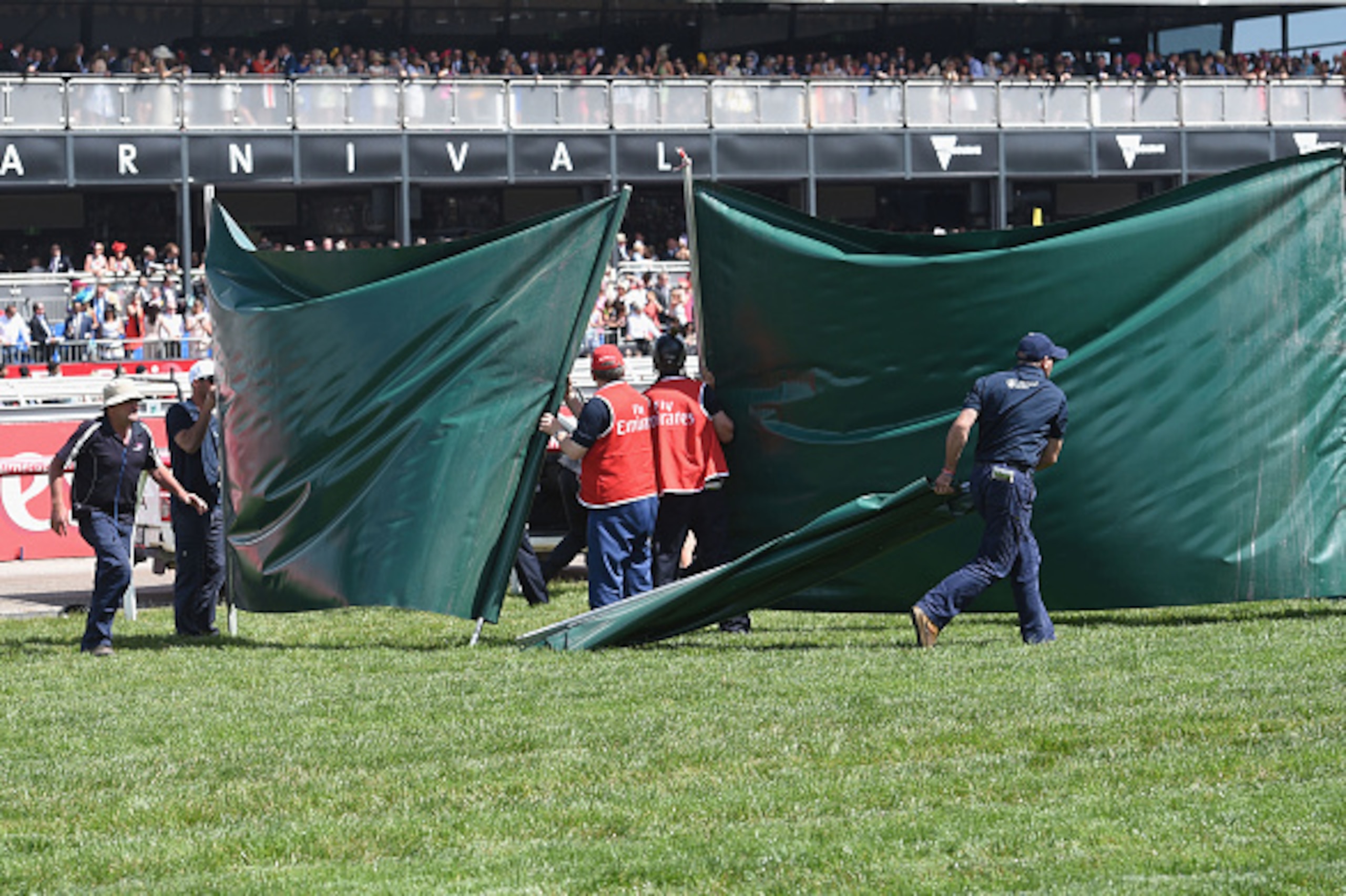 MELBOURNE, AUSTRALIA - NOVEMBER 03:  Green Screen is put up after Red Cadeaux is injured in race 7, the Emirates Melbourne Cup on Melbourne Cup Day at Flemington Racecourse on November 3, 2015 in Melbourne, Australia.  (Photo by Vince Caligiuri/Getty Imag