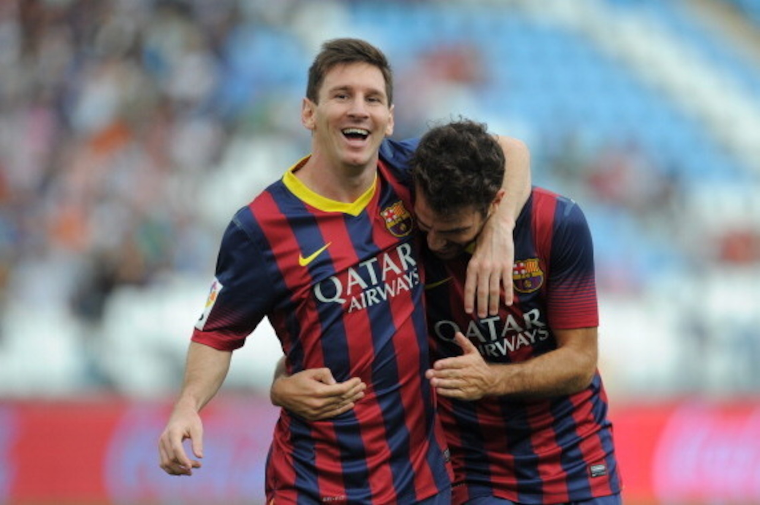 ALMERIA, SPAIN - SEPTEMBER 28:  Lionel Messi (L) celebrates with Cesc Fabregas
 after scoring FC Barcelona's opening goal during the La Liga match between UD Almeria and FC Barcelona on September 28, 2013 in Almeria, Spain.  (Photo by Denis Doyle/Getty Im