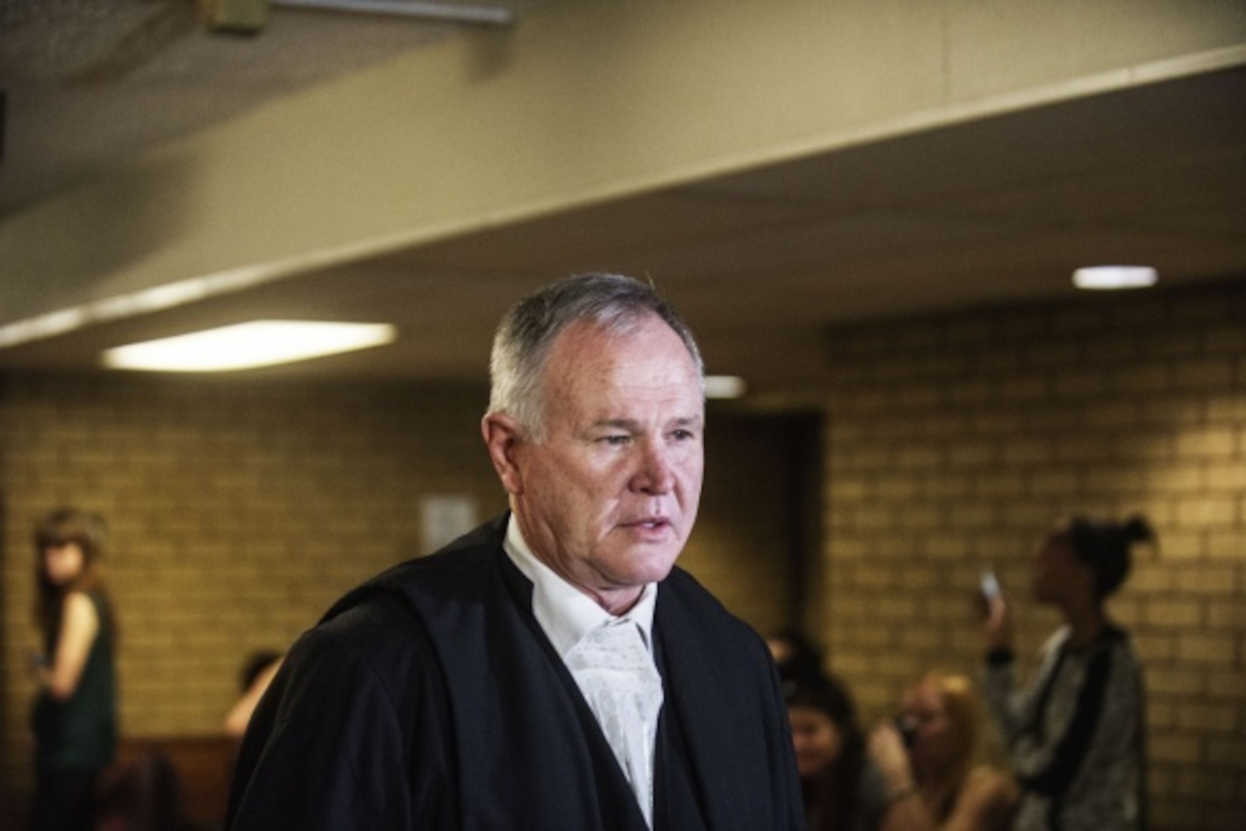 South African Paralympian athlete Oscar Pistorius' Chief defence Barry Roux arrives at the High Court in Pretoria on September 12, 2014. Pistorius arrived in court on Friday to face judgement for culpable homicide, a verdict that will decide if he walks f