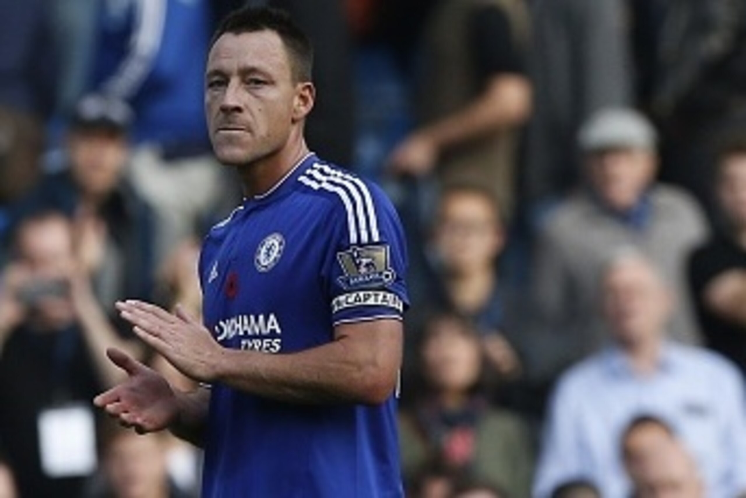 Chelseas English defender John Terry (L) and Chelseas English defender Gary Cahill react at the final whistle in the English Premier League football match between Chelsea and Liverpool at Stamford Bridge in London on October 31, 2015. Liverpool won the ga