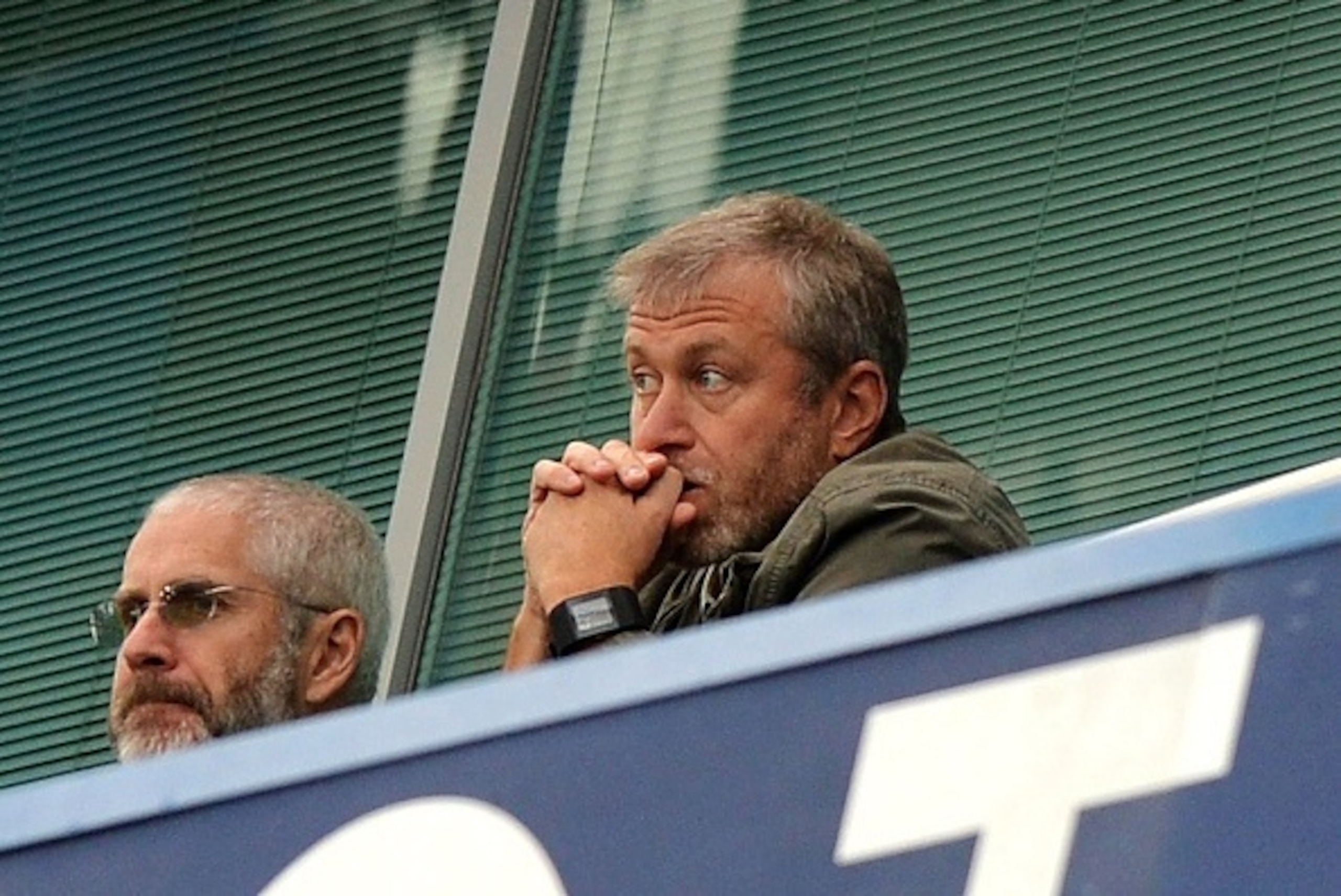 Chelsea's Russian owner Roman Abramovich watches the action during the English Premier League football match between Chelsea and Aston Villa at Stamford Bridge in London, on October 17, 2015. AFP PHOTO / OLLY GREENWOOD

RESTRICTED TO EDITORIAL USE. No use