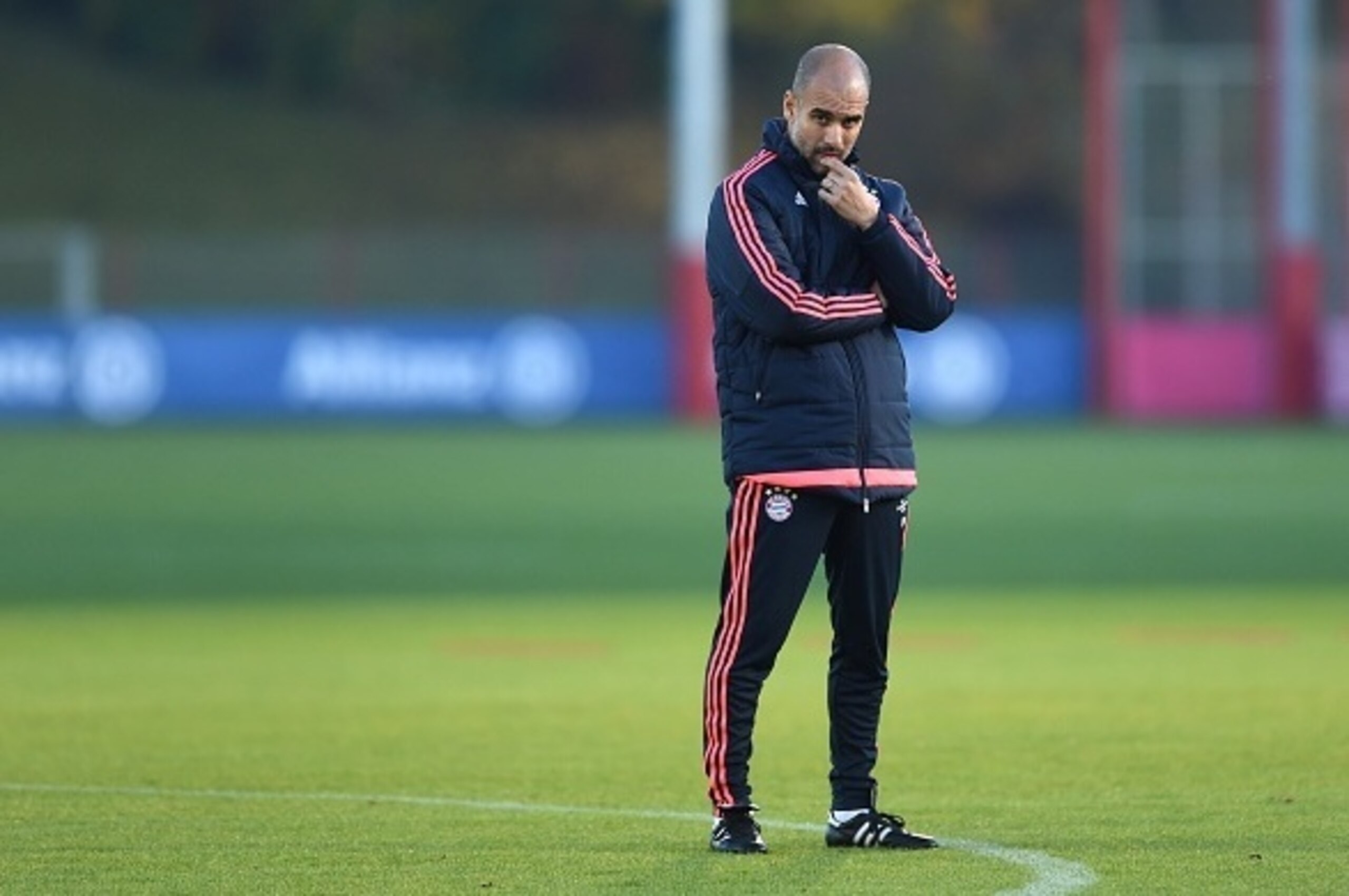 Bayern Munich's Spanish head coach Pep Guardiola watches his players during the training session on the eve of the UEFA Champions League Group F second-leg football match between Bayern Munich and Arsenal FC in Munich, southern Germany, on November 3, 201