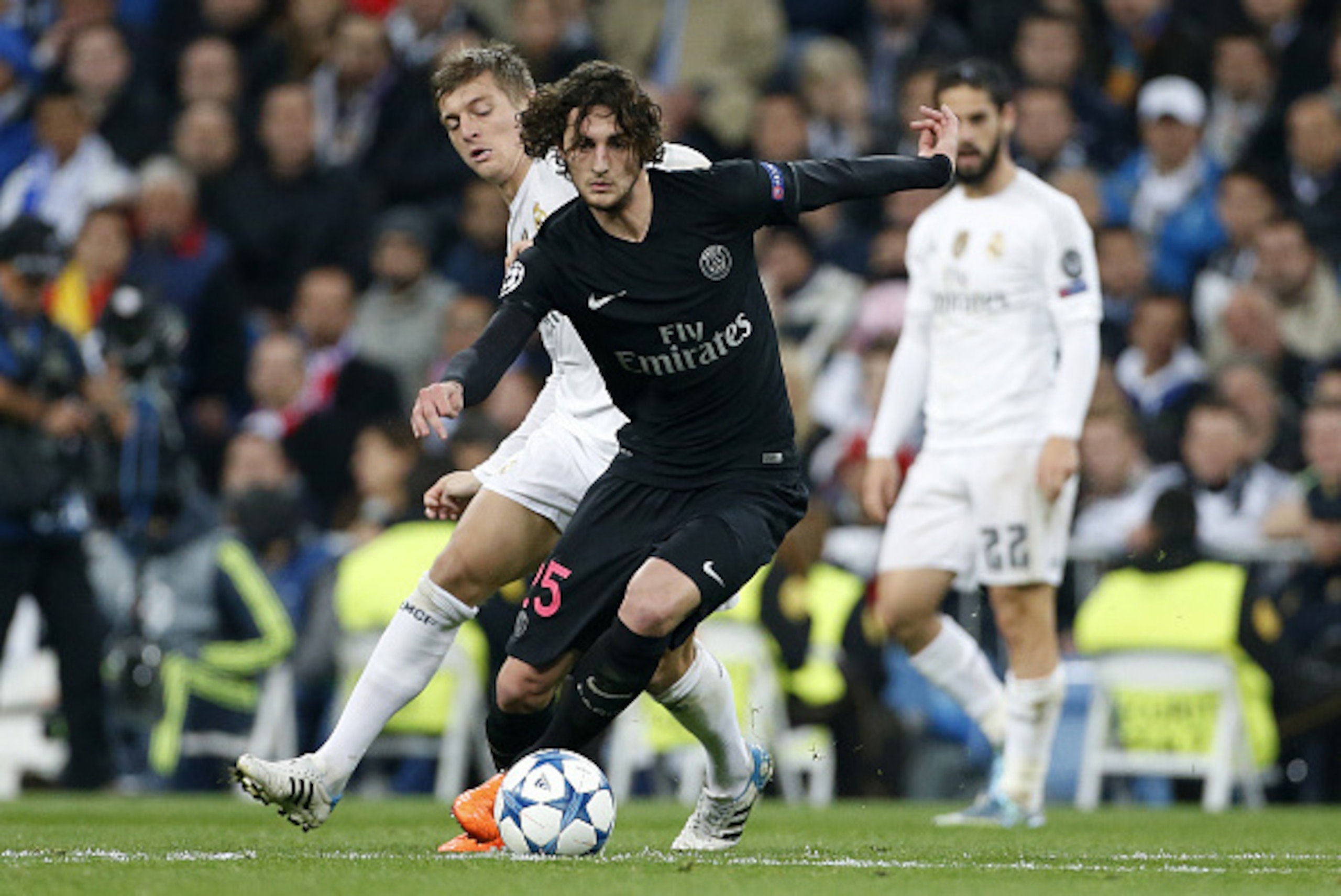 MADRID, SPAIN - NOVEMBER 3: Adrien Rabiot of PSG and Toni Kroos of Real Madrid in action during the UEFA Champions League match between Real Madrid and Paris Saint-Germain (PSG) at Santiago Bernabeu stadium on November 3, 2015 in Madrid, Spain. (Photo by 