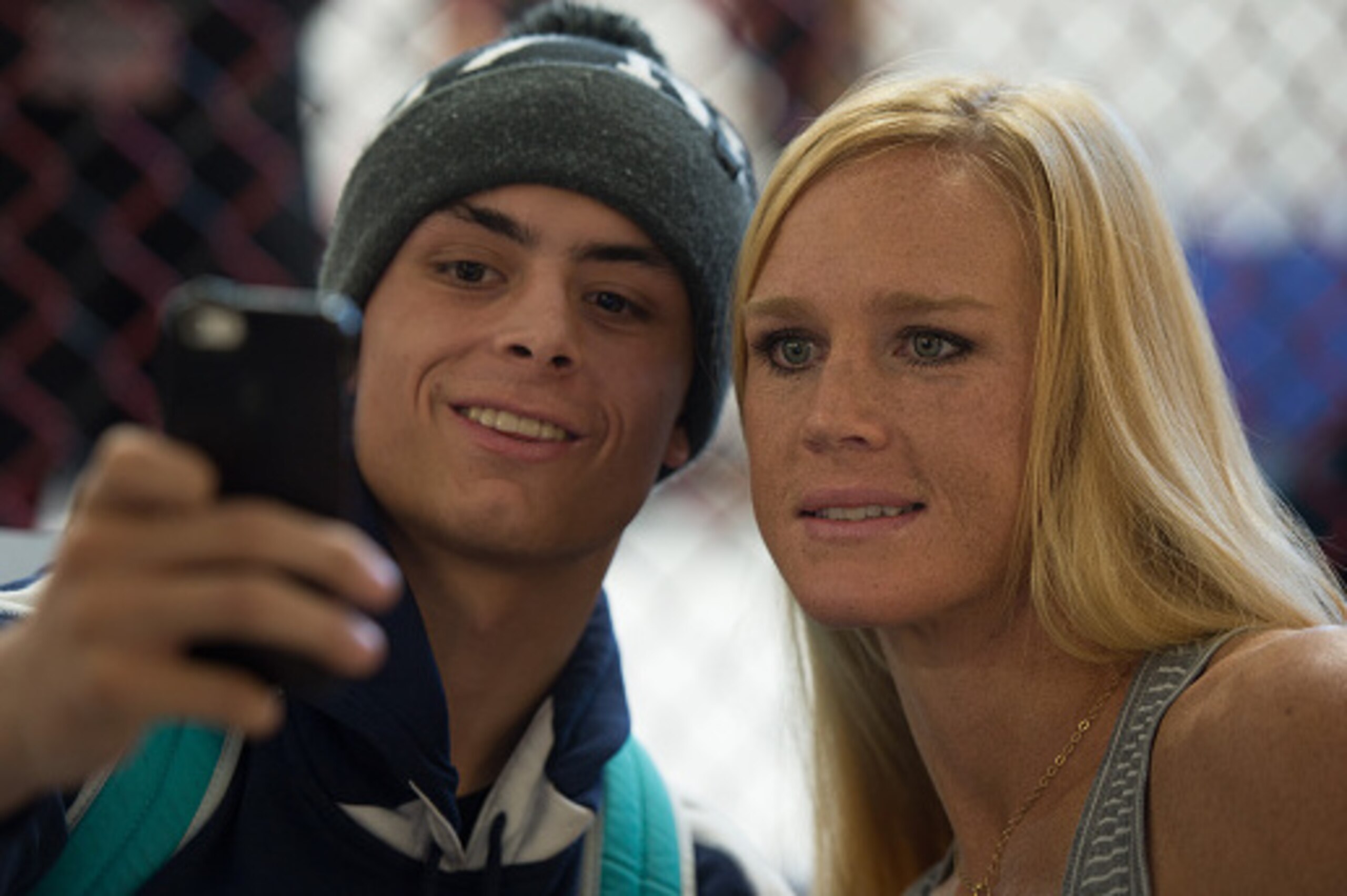 ALBUQUERQUE, NM - OCTOBER 31:  Holly Holm takes a picture with a fan during the Jackson Wink MMA Academy Grand Opening at Jackson's Mixed Martial Arts & Fitness on October 31, 2015 in Albuquerque, New Mexico. (Photo by Brandon Magnus/Zuffa LLC/Zuffa LLC v