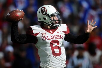 LAWRENCE KS, - OCTOBER 31: Quarterback Baker Mayfield #6 of the Oklahoma Sooners throws a pass against the Kansas Jayhawks on October 31, 2015 at Memorial Stadium in Lawrence, Kansas. (Photo by Jackson Laizure/Getty Images)