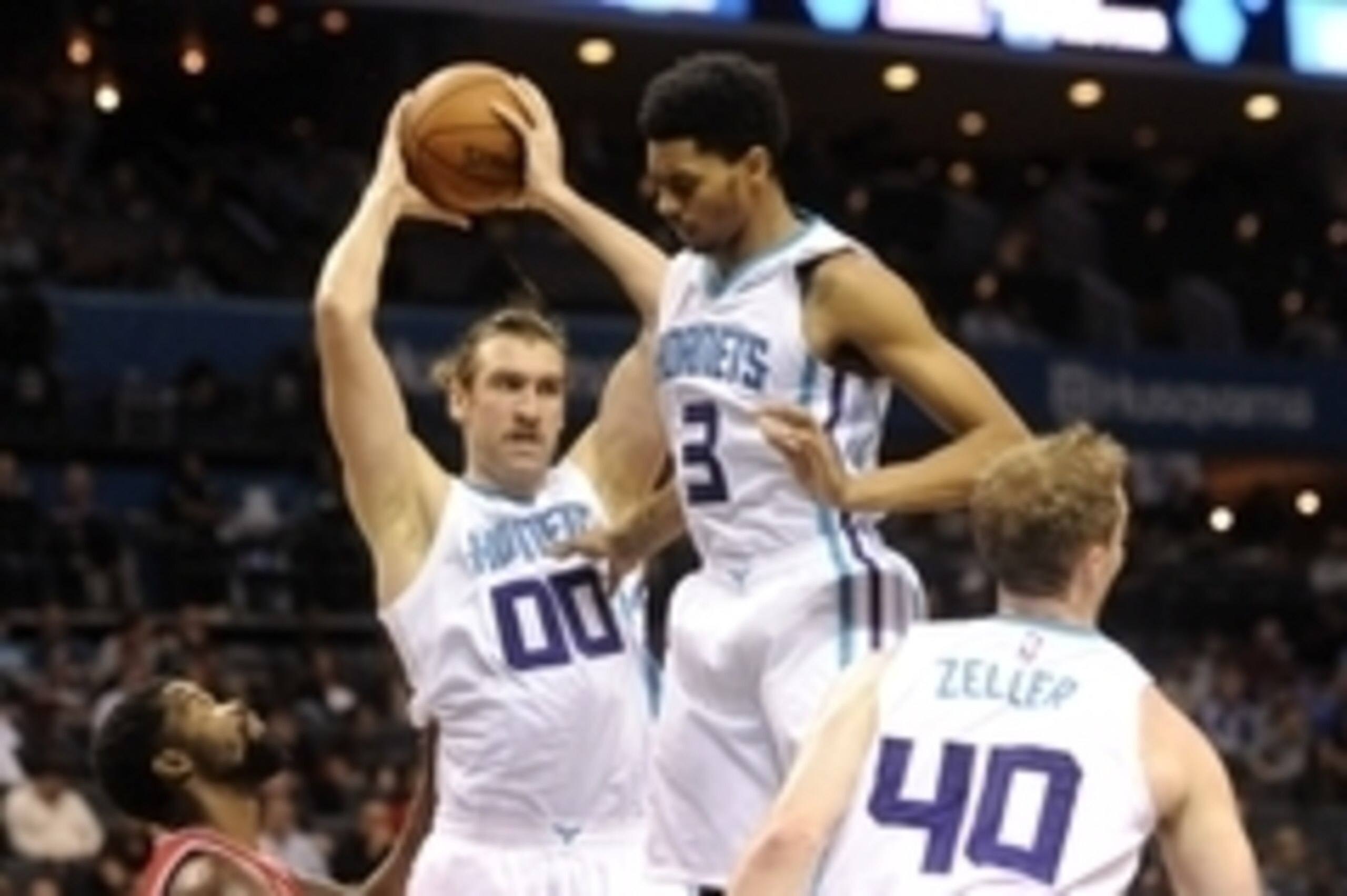 Nov 3, 2015; Charlotte, NC, USA; Charlotte Hornets forward center Spencer Hawes (00) gets a rebound with guard Jeremy Lamb (3) and forward Cody Zeller (40) during the second half of the game at Time Warner Cable Arena. Hornets win 130 -105. Mandatory Cred Nov 3, 2015; Charlotte, NC, USA; Charlotte Hornets forward center Spencer Hawes (00) gets a rebound with guard Jeremy Lamb (3) and forward Cody Zeller (40) during the second half of the game at Time Warner Cable Arena. Hornets win 130 -105. Mandatory Cred